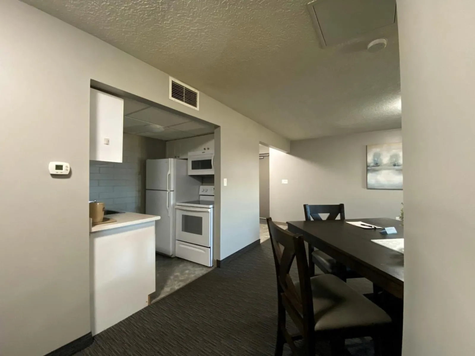 Kitchen or kitchenette in Stanford Inn & Suites