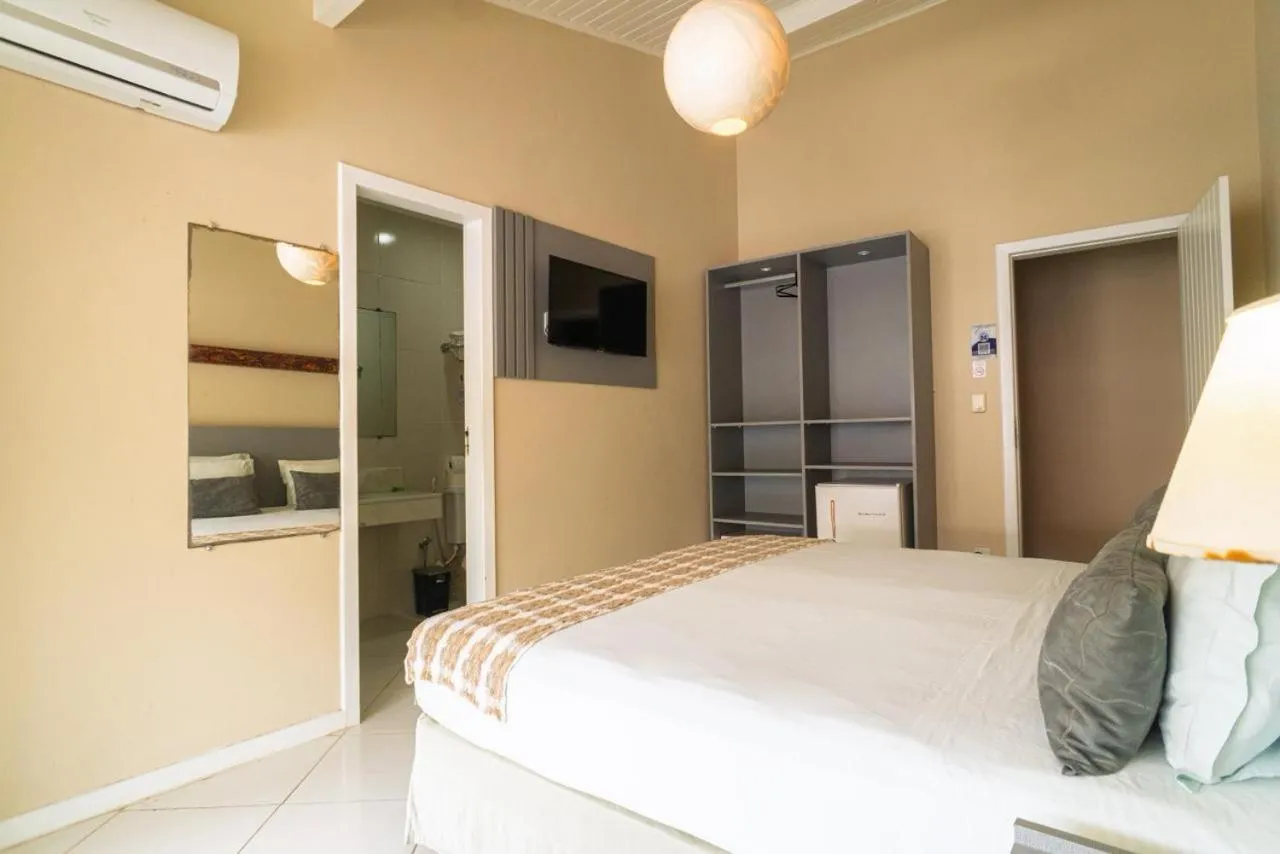 Bed in Pousada Mareia