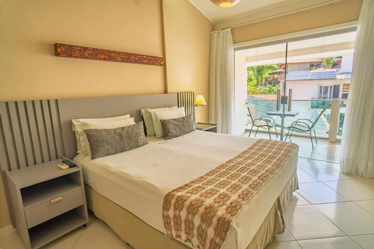 Bed in Pousada Mareia