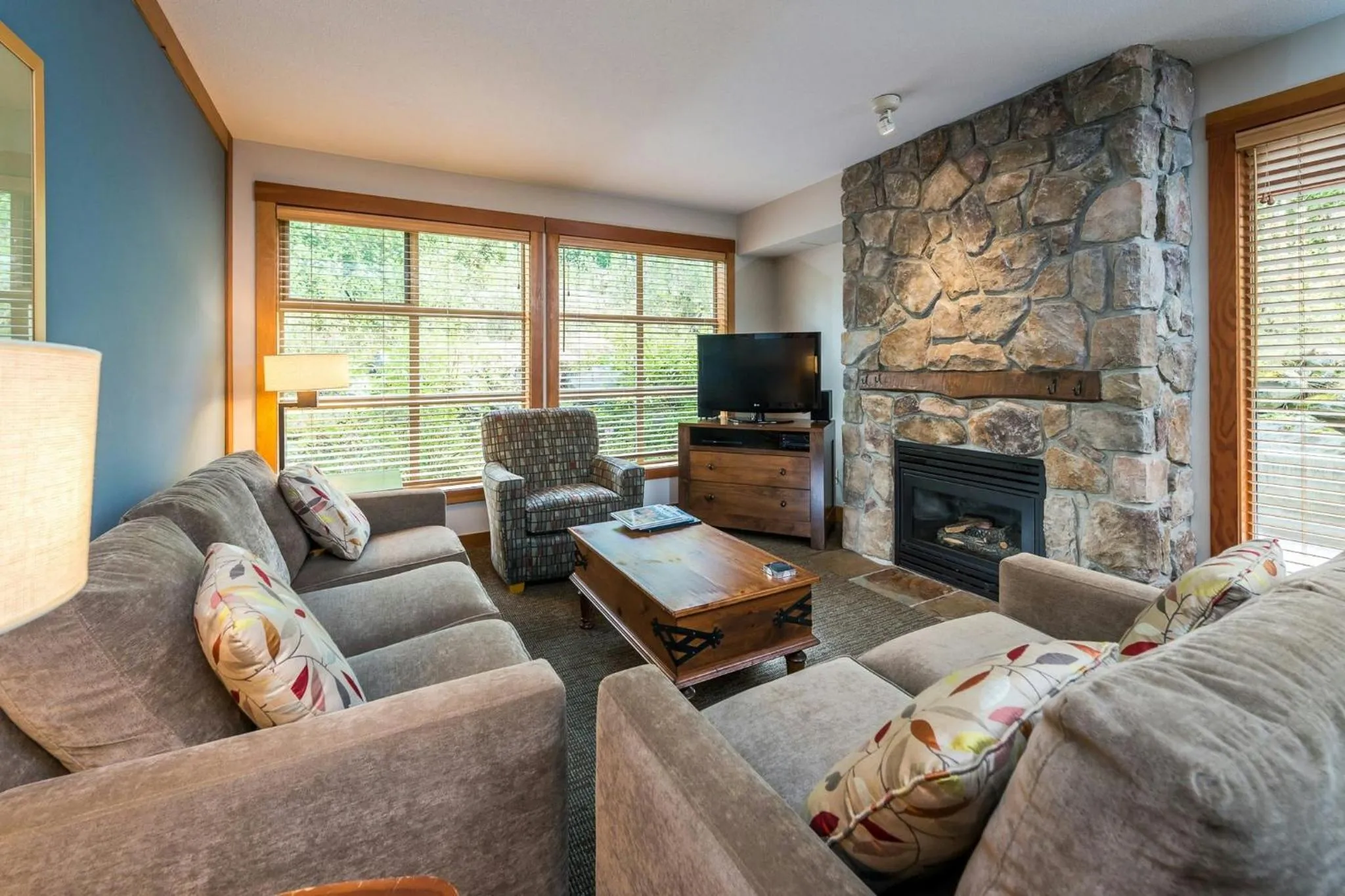 Living room in Legends Whistler, by Lodging Ovations