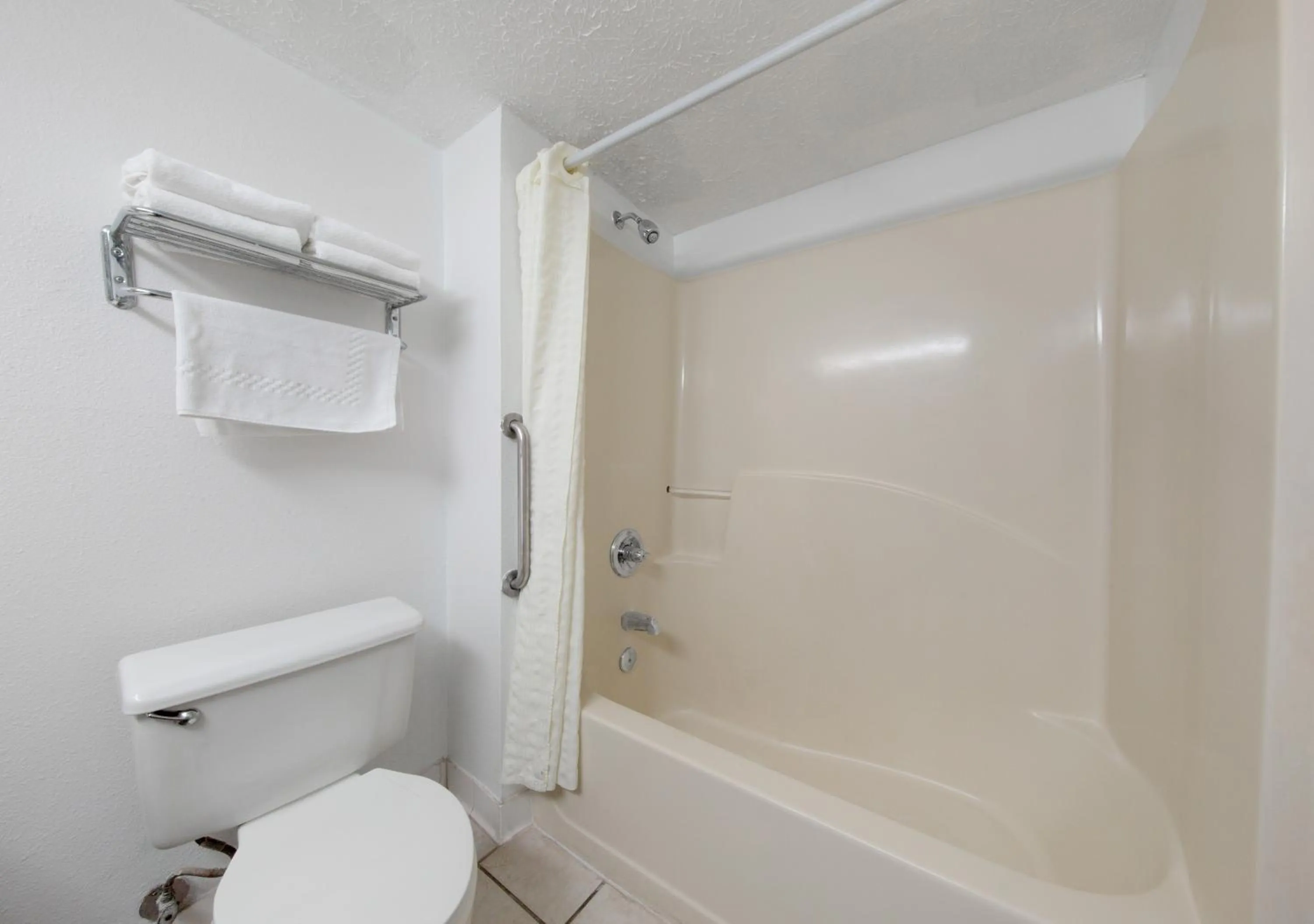 Bathroom in Beachcomber Beachfront Hotel, a By The Sea Resort