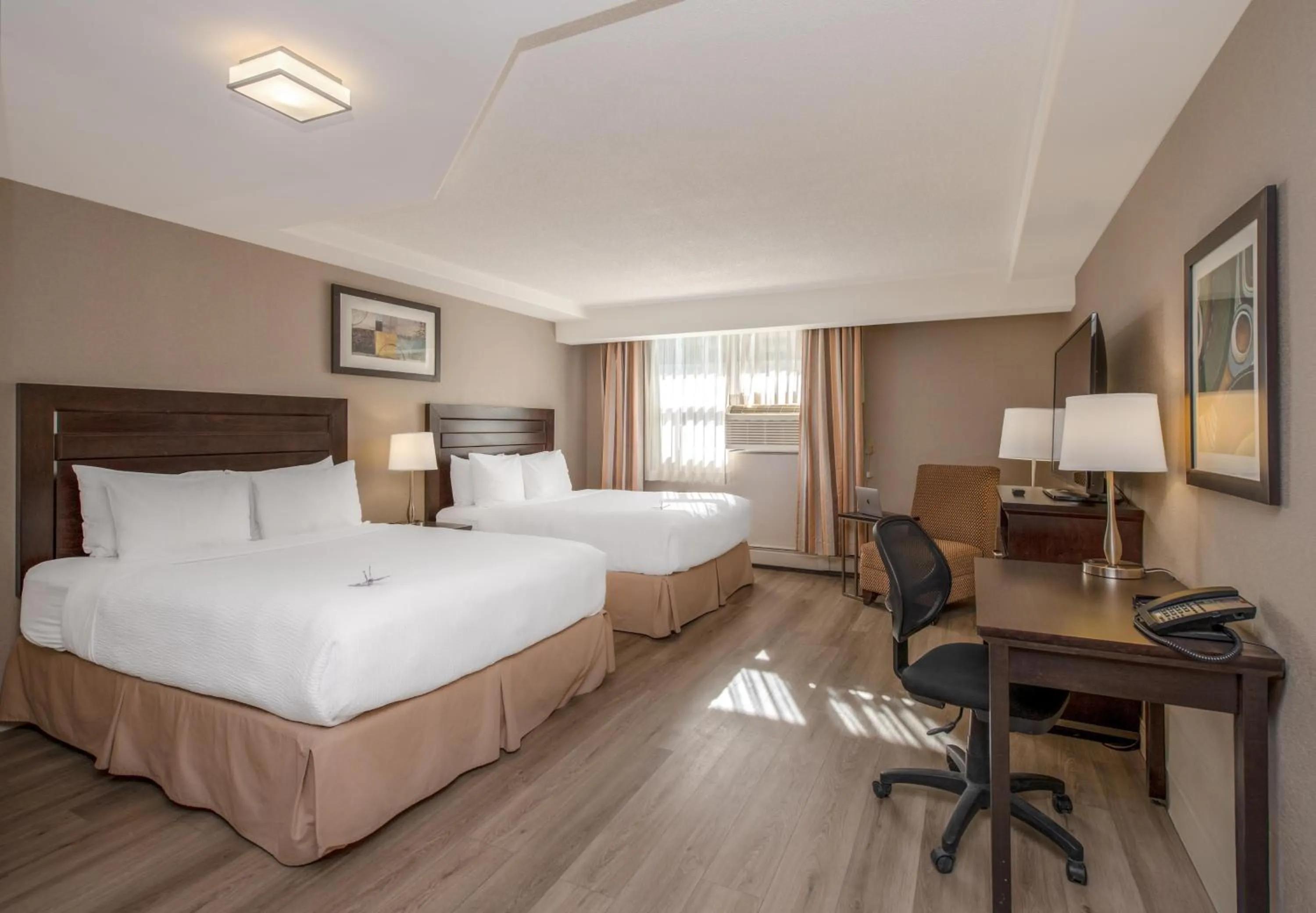 Bedroom, Bed in Coast Calgary Downtown Hotel & Suites by APA