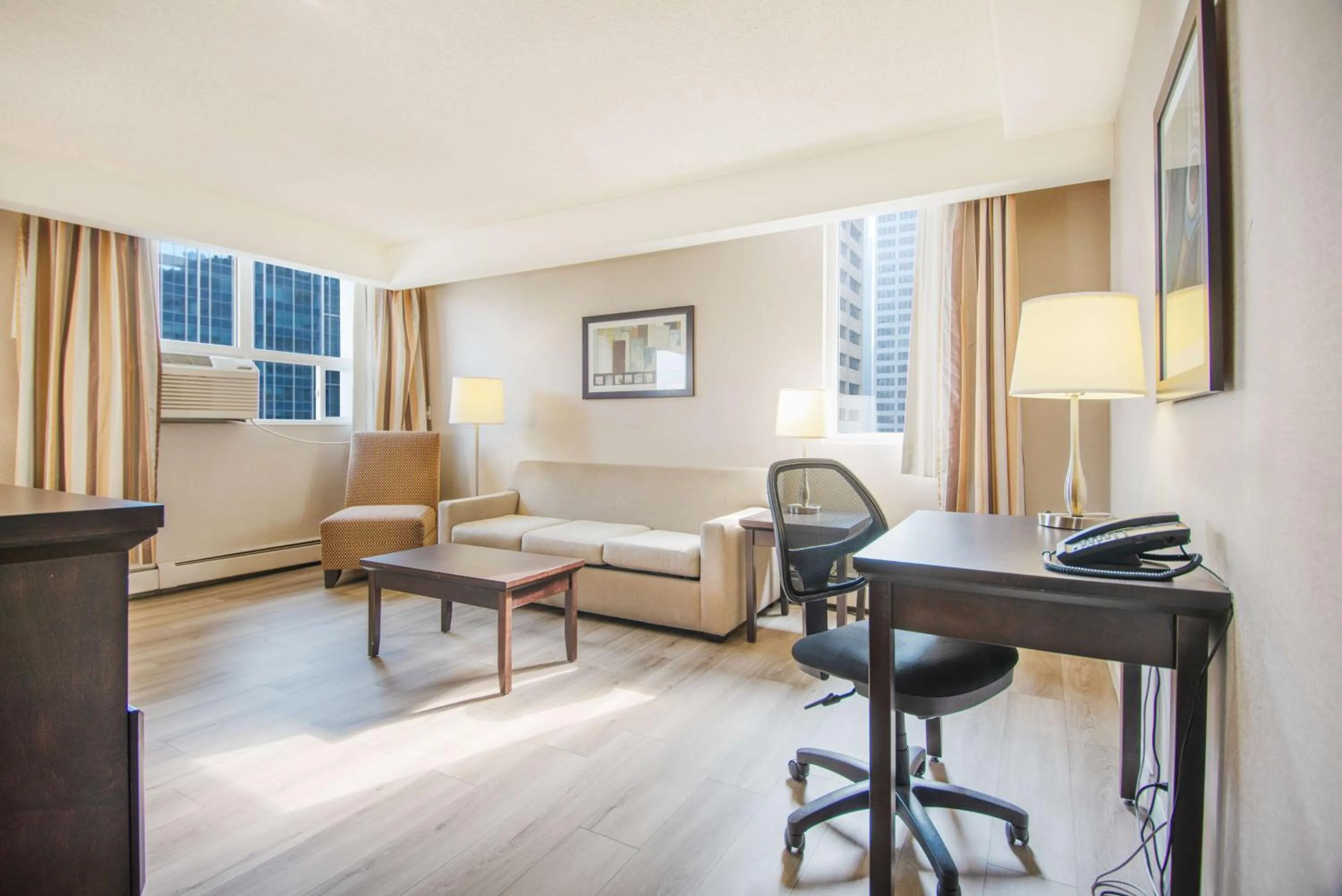 Bedroom in Coast Calgary Downtown Hotel & Suites by APA