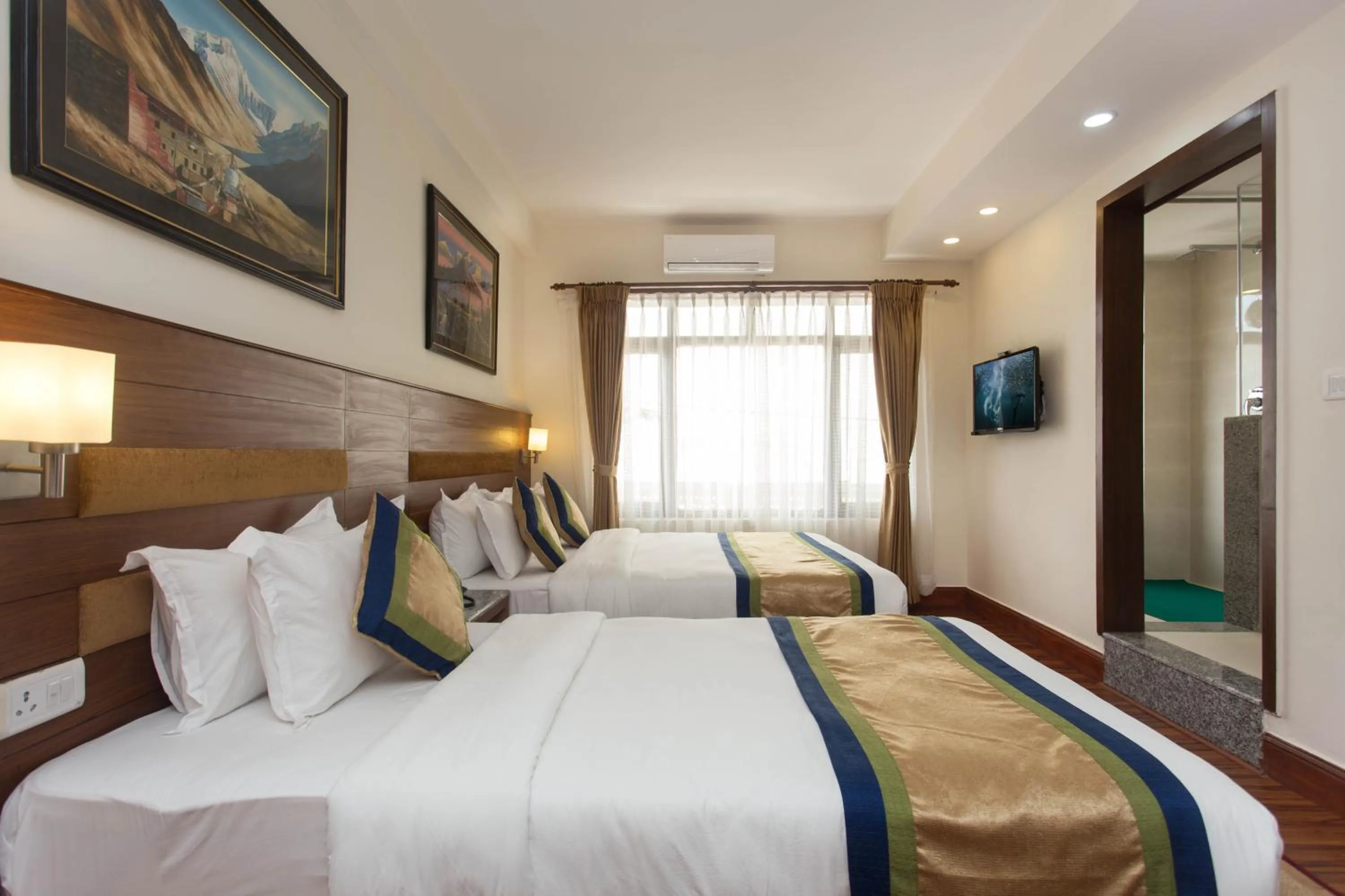 Shower, Bed in Oasis Kathmandu Hotel