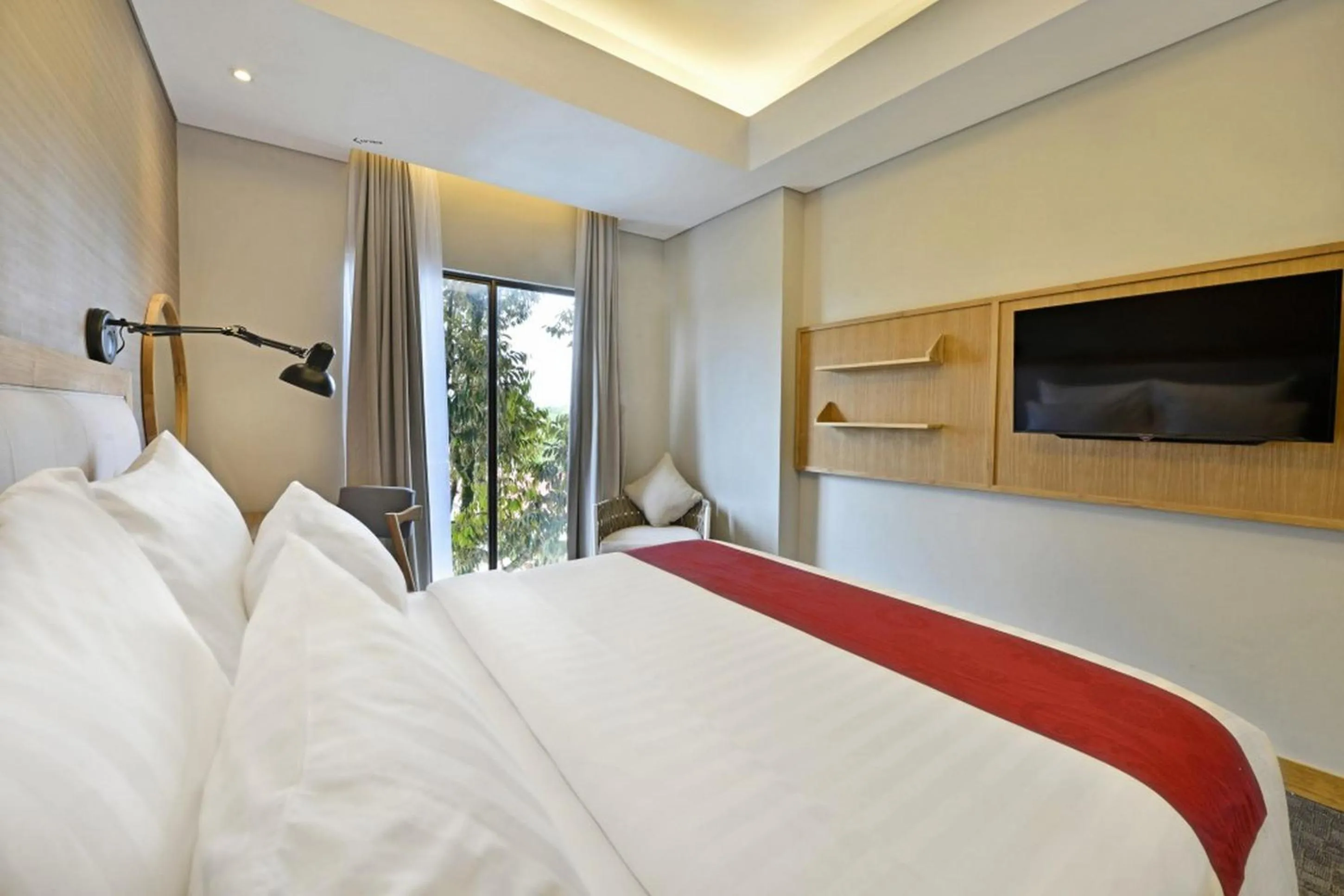 Bed in Famvida Hotel Lubuklinggau