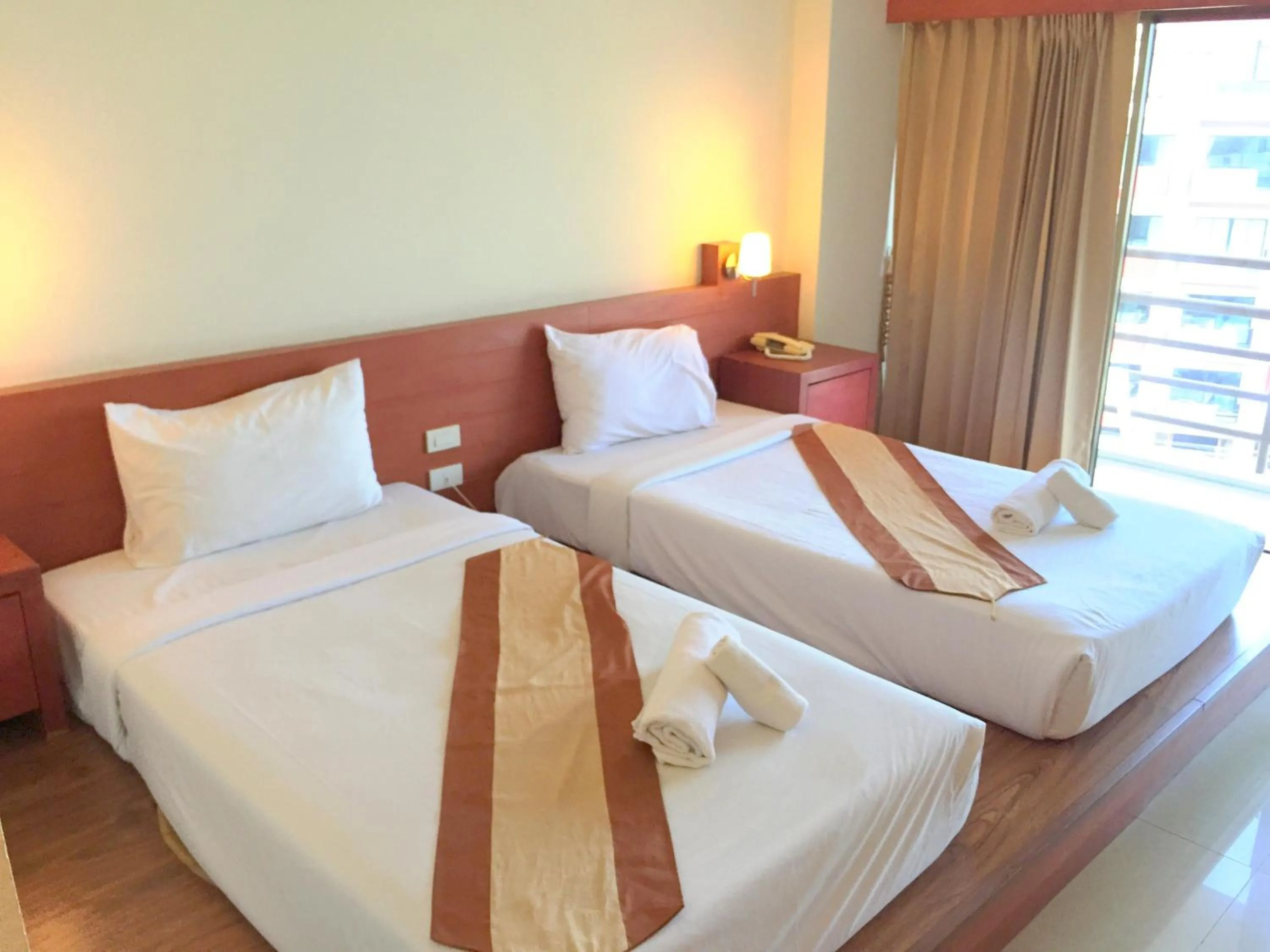 Bed in Tanawit Hotel & Spa