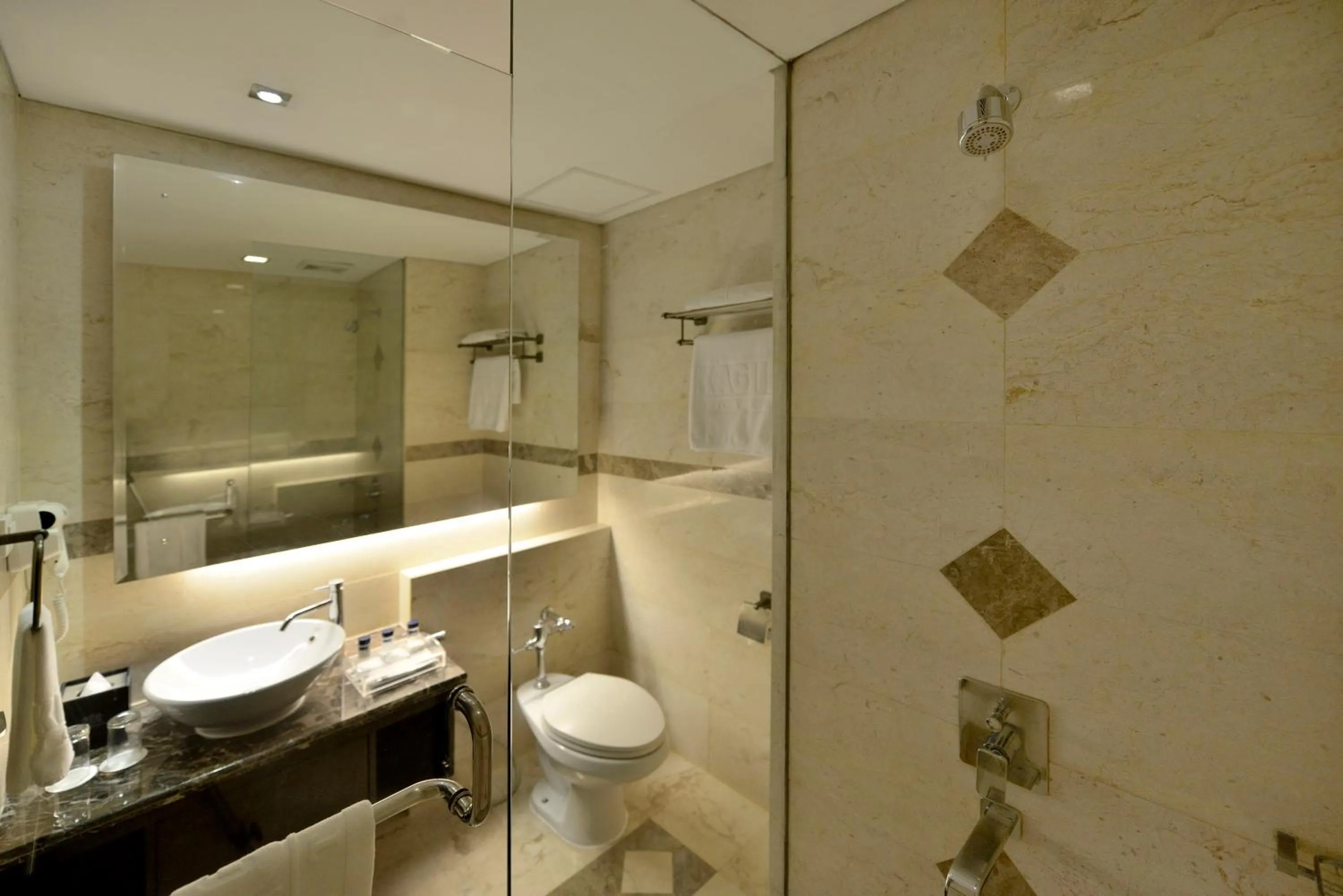 Bathroom in Gino Feruci Kebon Jati by KAGUM Hotels