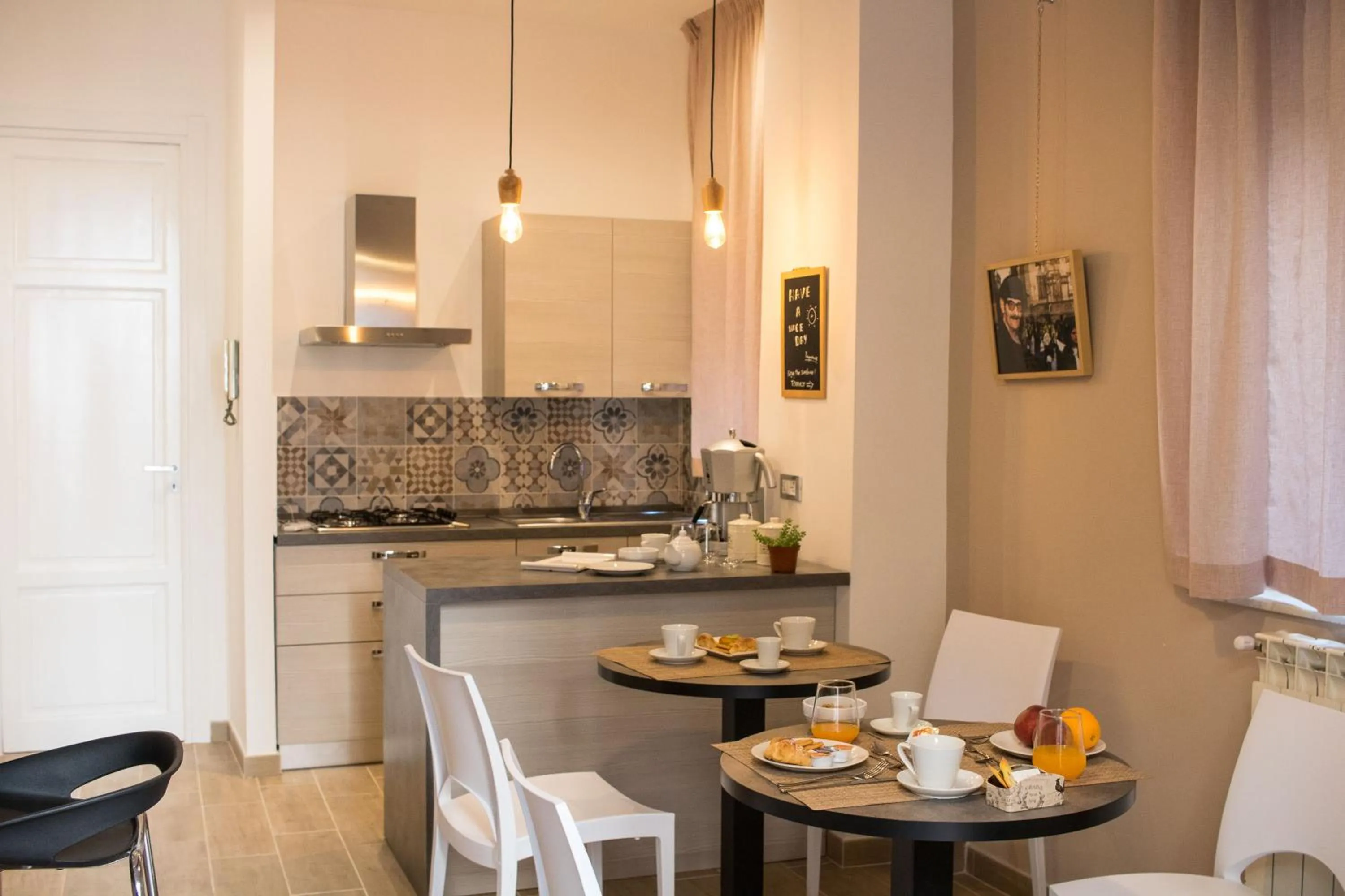 Communal lounge/ TV room in Bagnasco 18 suite&terrace