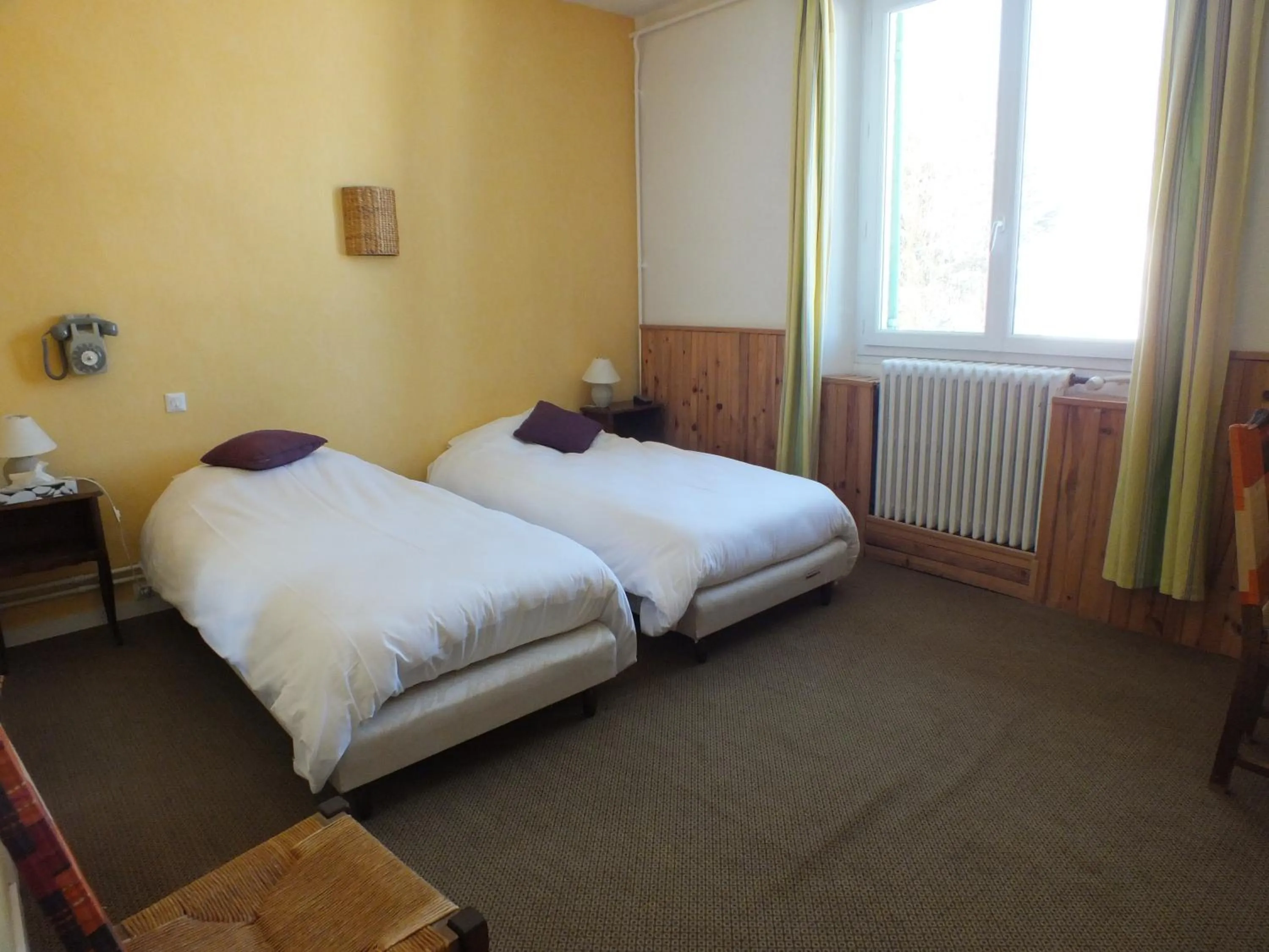 Bed in Hotel La Prairie