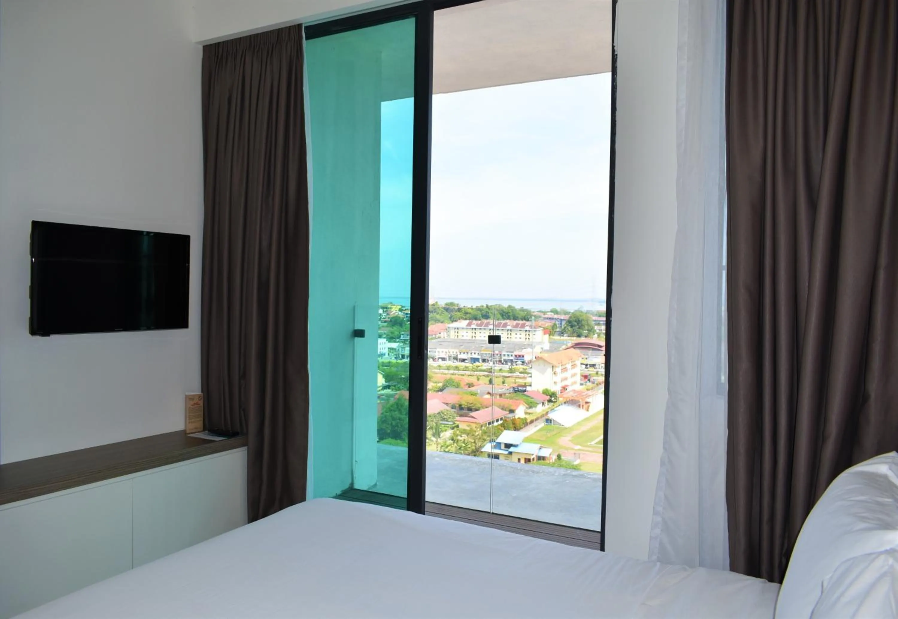 Bed in D'Wharf Hotel & Serviced Residence