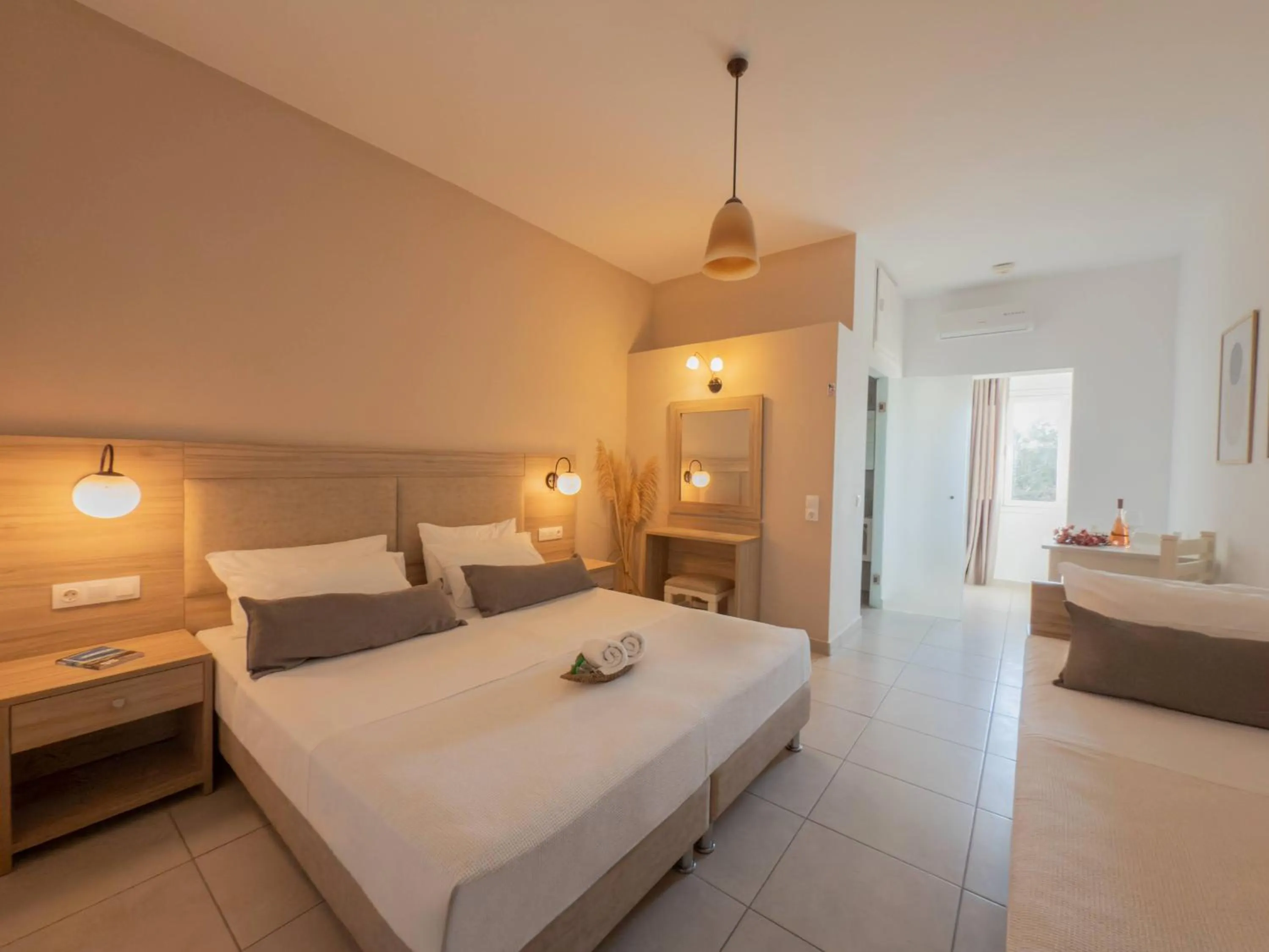 Bed in Mastorakis Hotel and Studios