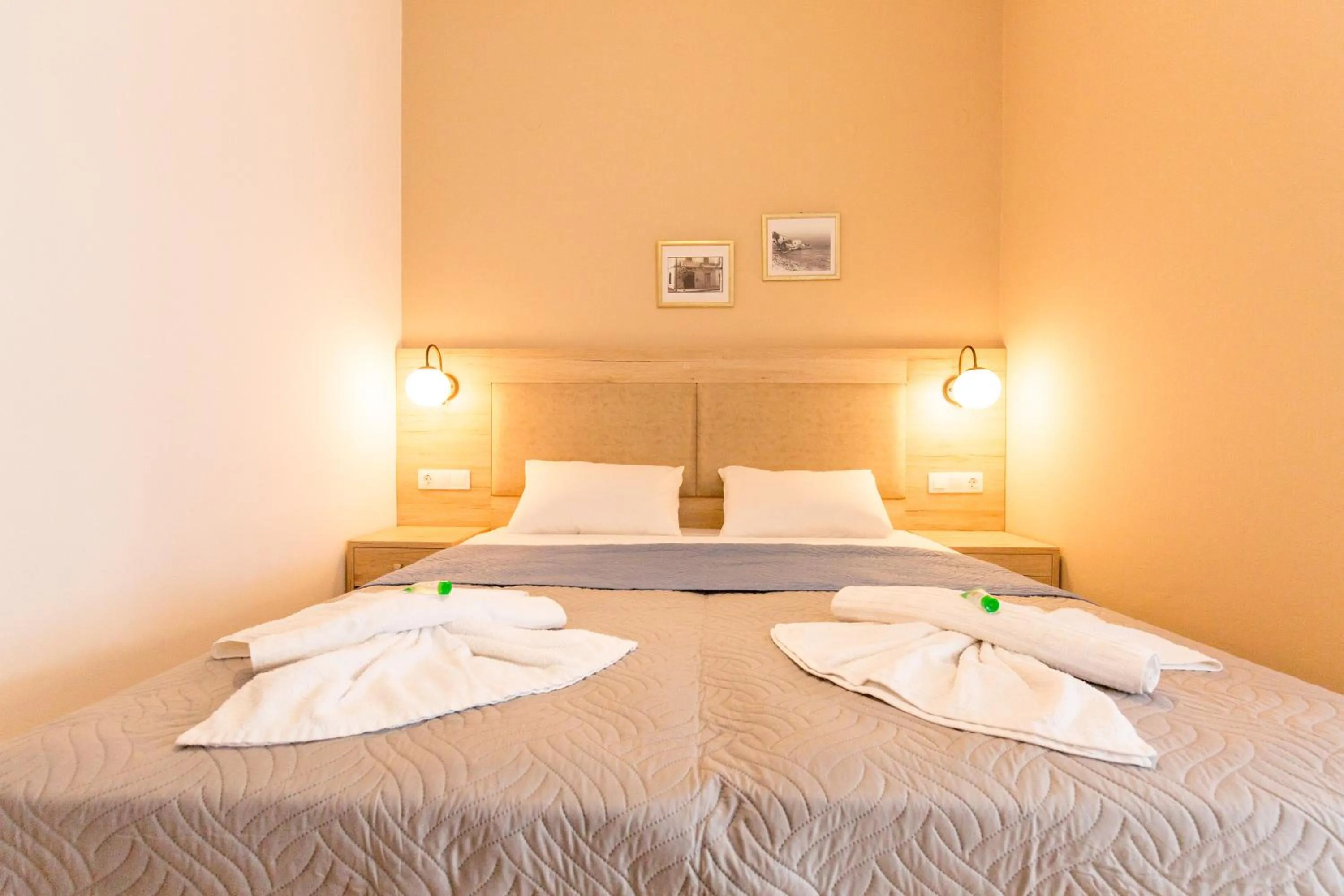 Bed in Mastorakis Hotel and Studios