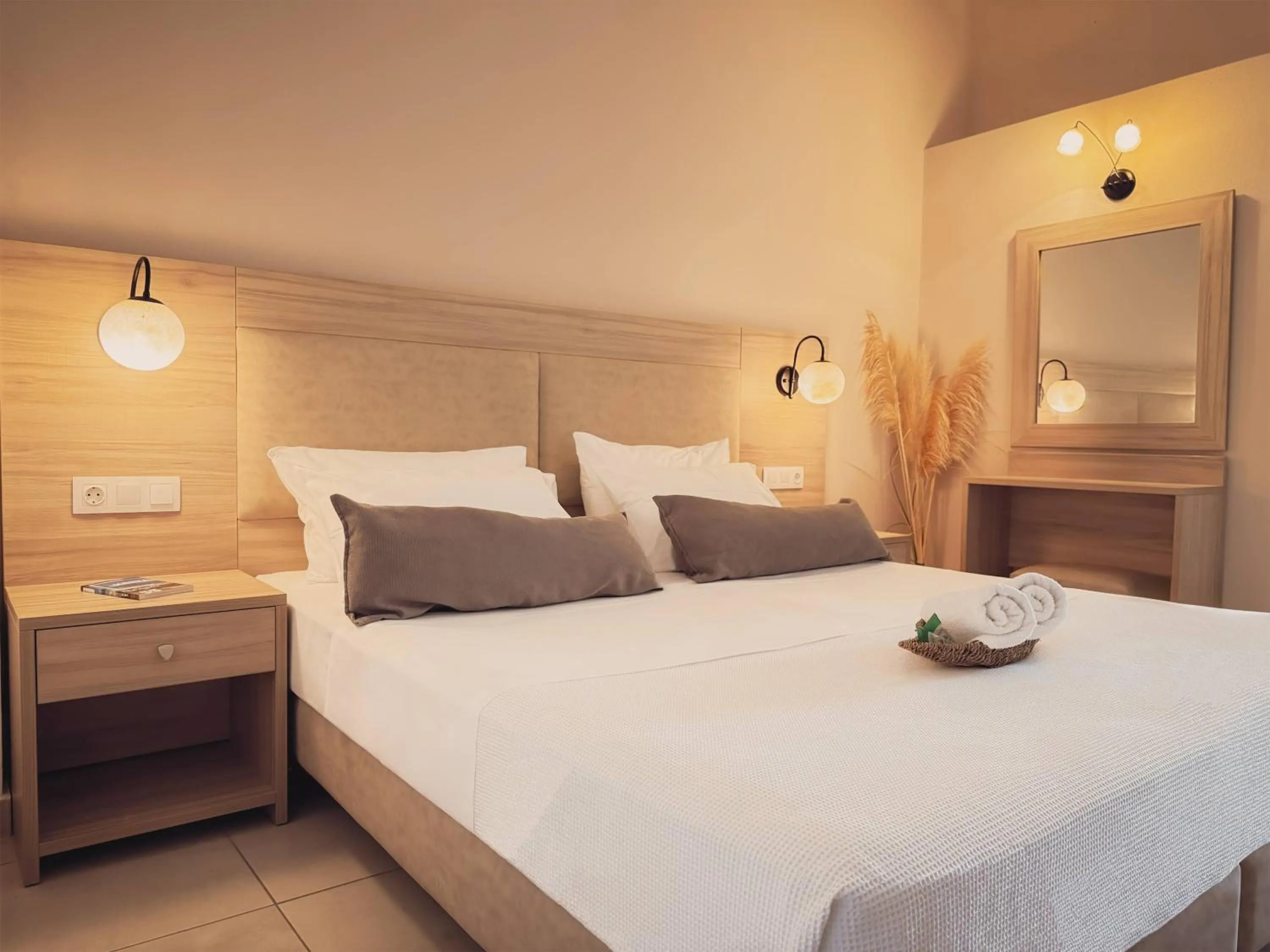 Bed in Mastorakis Hotel and Studios