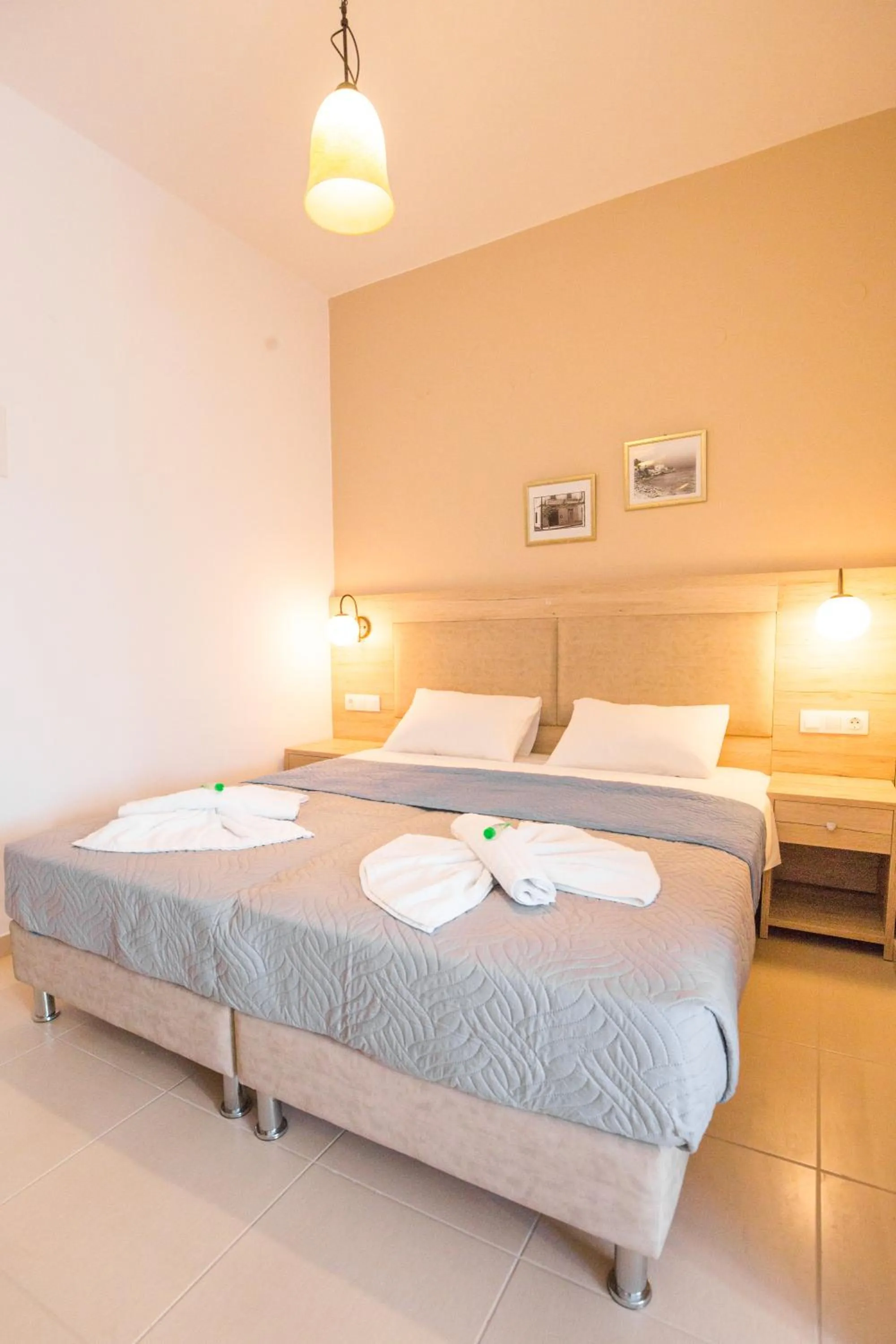 Bed in Mastorakis Hotel and Studios