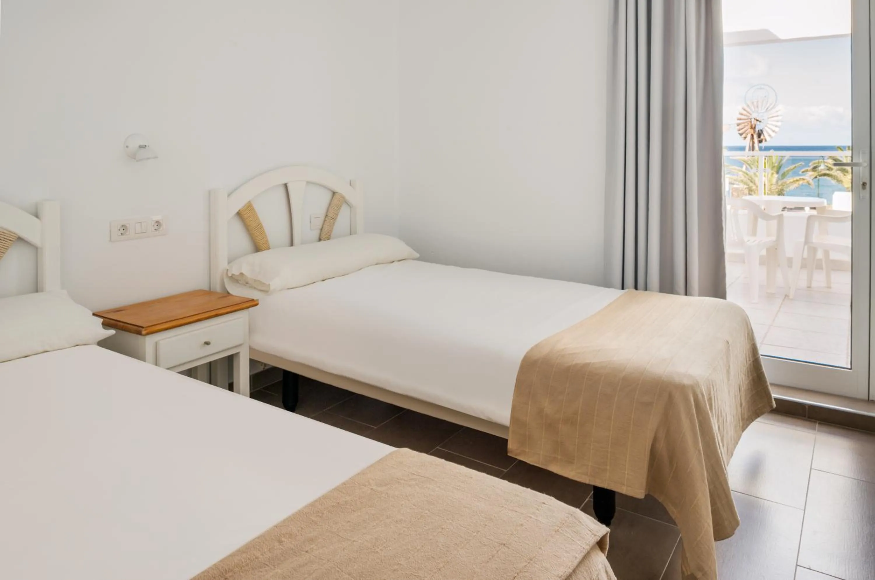 Bedroom, Bed in Neptuno Suites - Adults Only