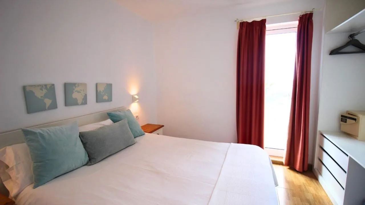 Bed in Neptuno Suites - Adults Only