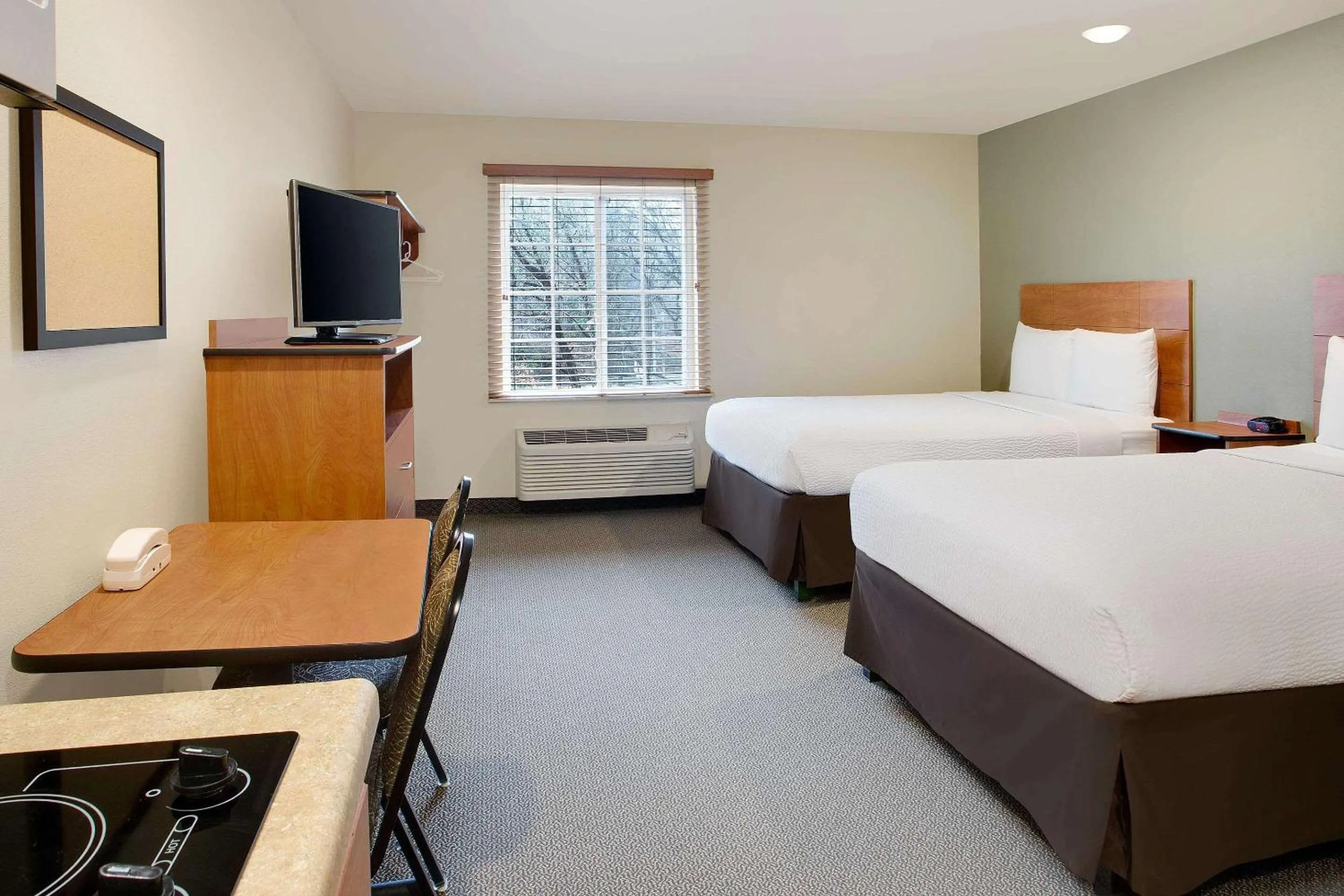 Photo of the whole room, Bed in WoodSpring Suites Virginia Beach