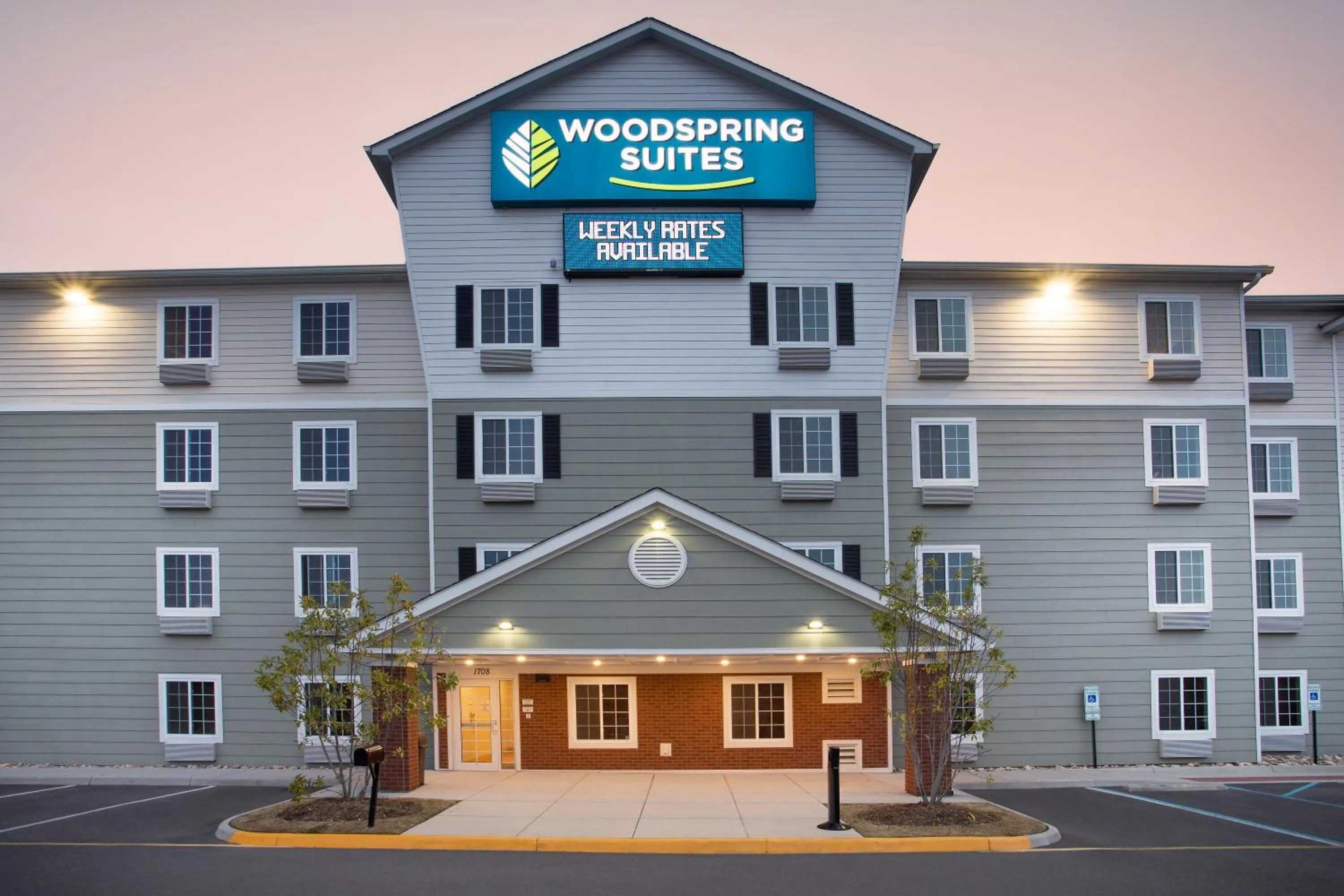 Property logo or sign in WoodSpring Suites Chesapeake-Norfolk Greenbrier