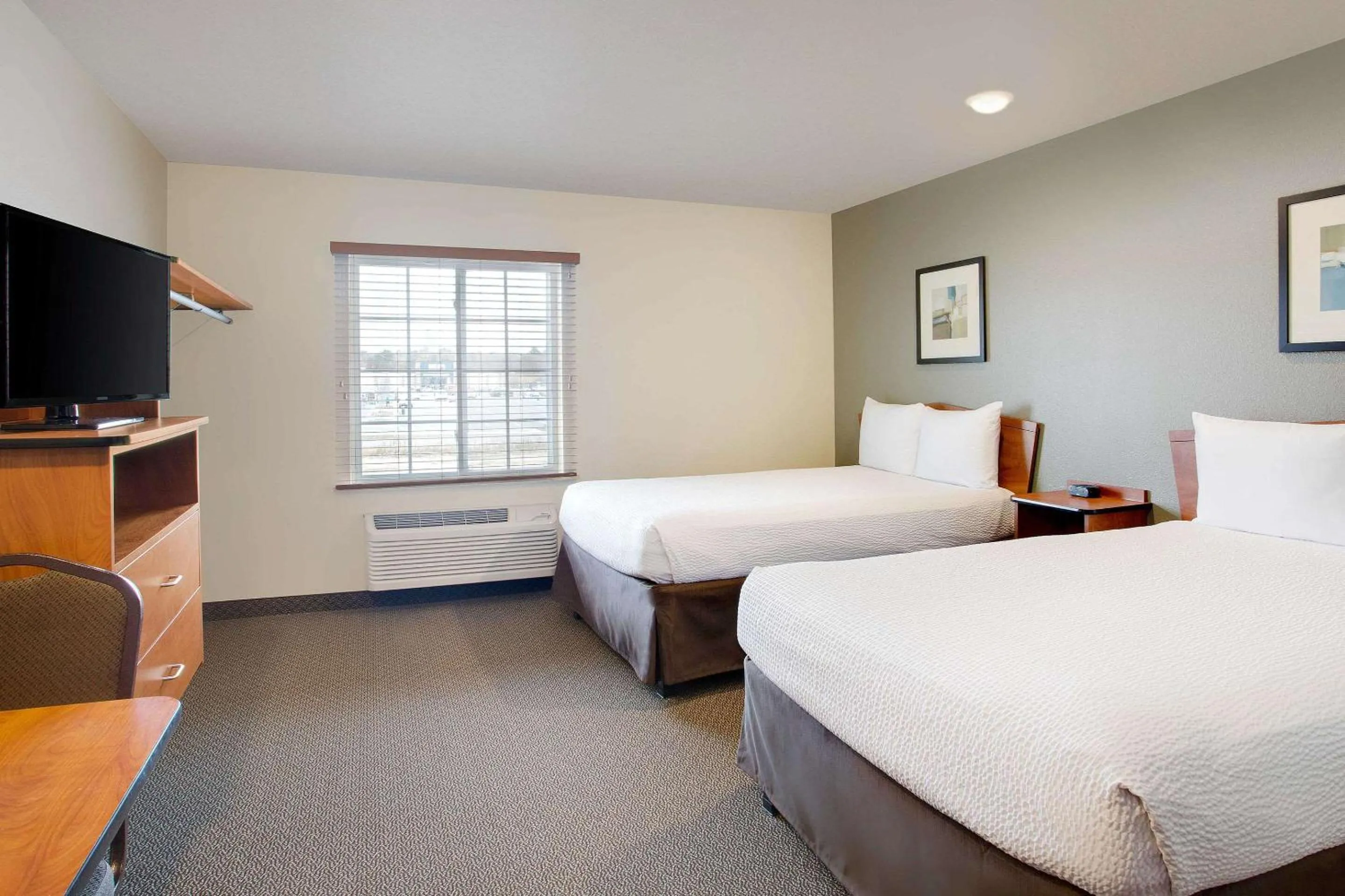 Photo of the whole room, Bed in WoodSpring Suites Chesapeake-Norfolk Greenbrier