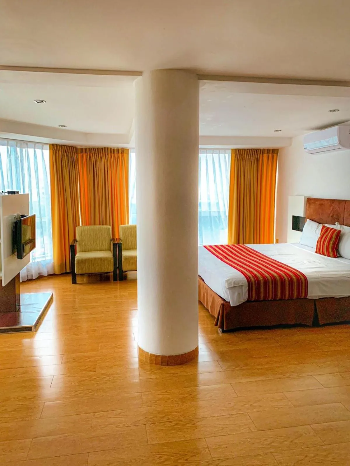 Bed in Allpa Hotel & Suites