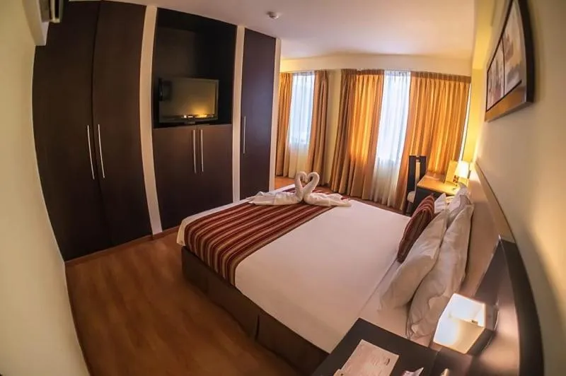 Bed in Allpa Hotel & Suites