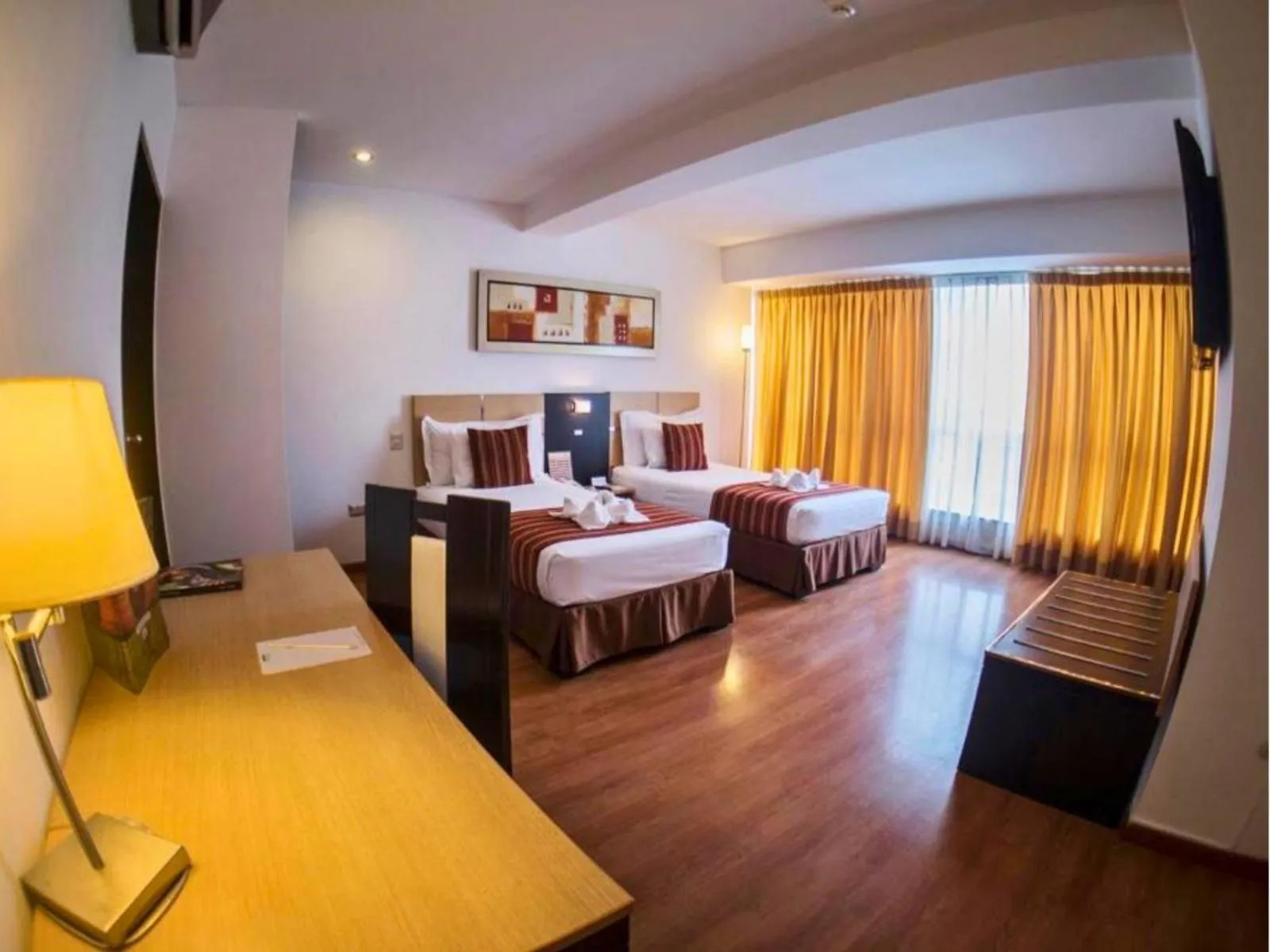 Bed in Allpa Hotel & Suites