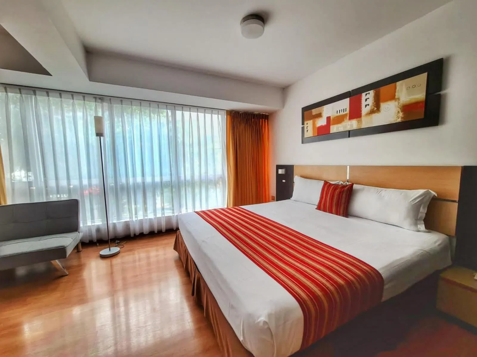 Bed in Allpa Hotel & Suites