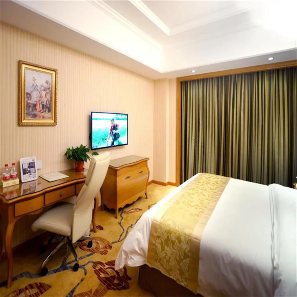 Bed in Vienna Hotel Shanghai Meilan Lake Metro Station