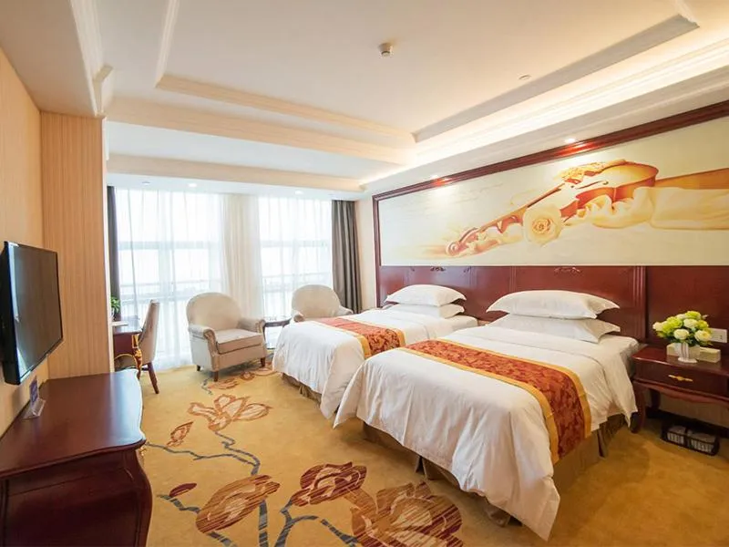Bed in Vienna Hotel Zhejiang Huzhou Changxing Mingzhu Road