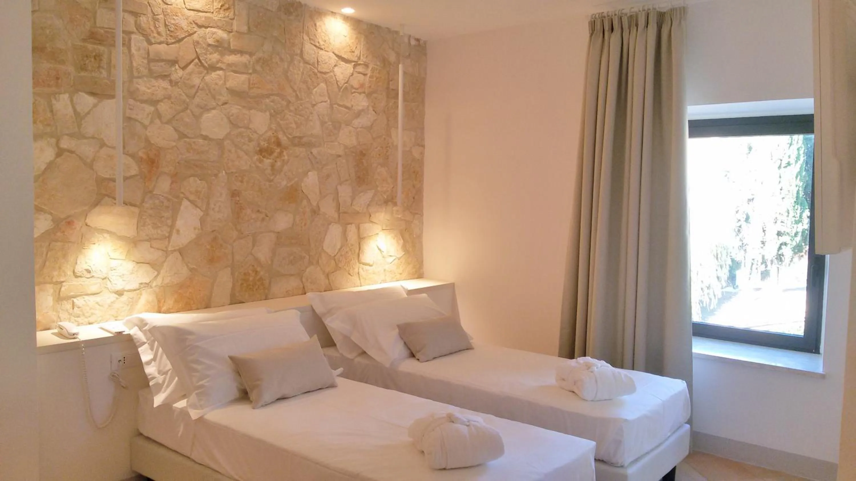 Bed in Giotto Country House & Spa