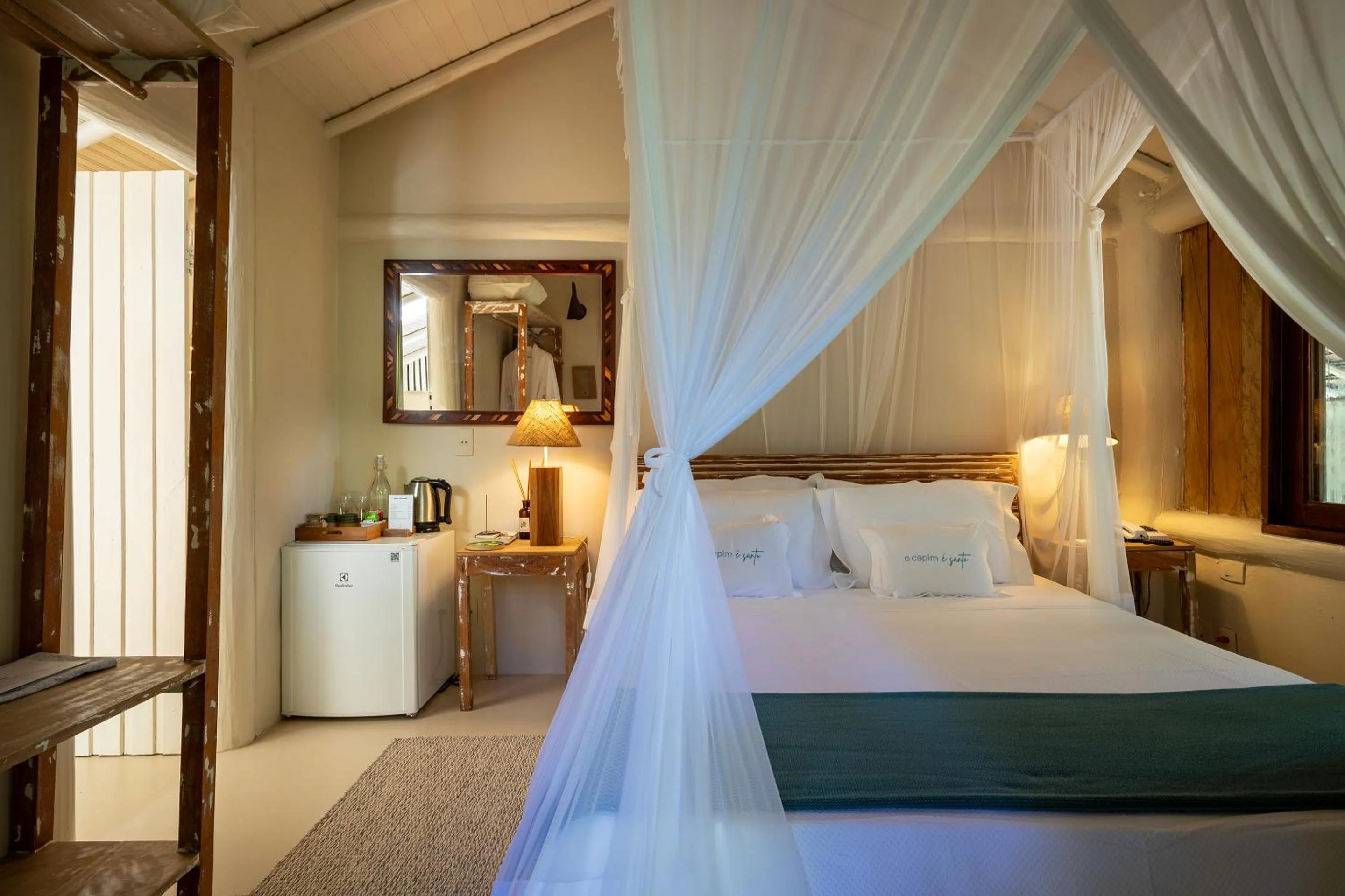 Property building, Bed in Pousada Capim Santo