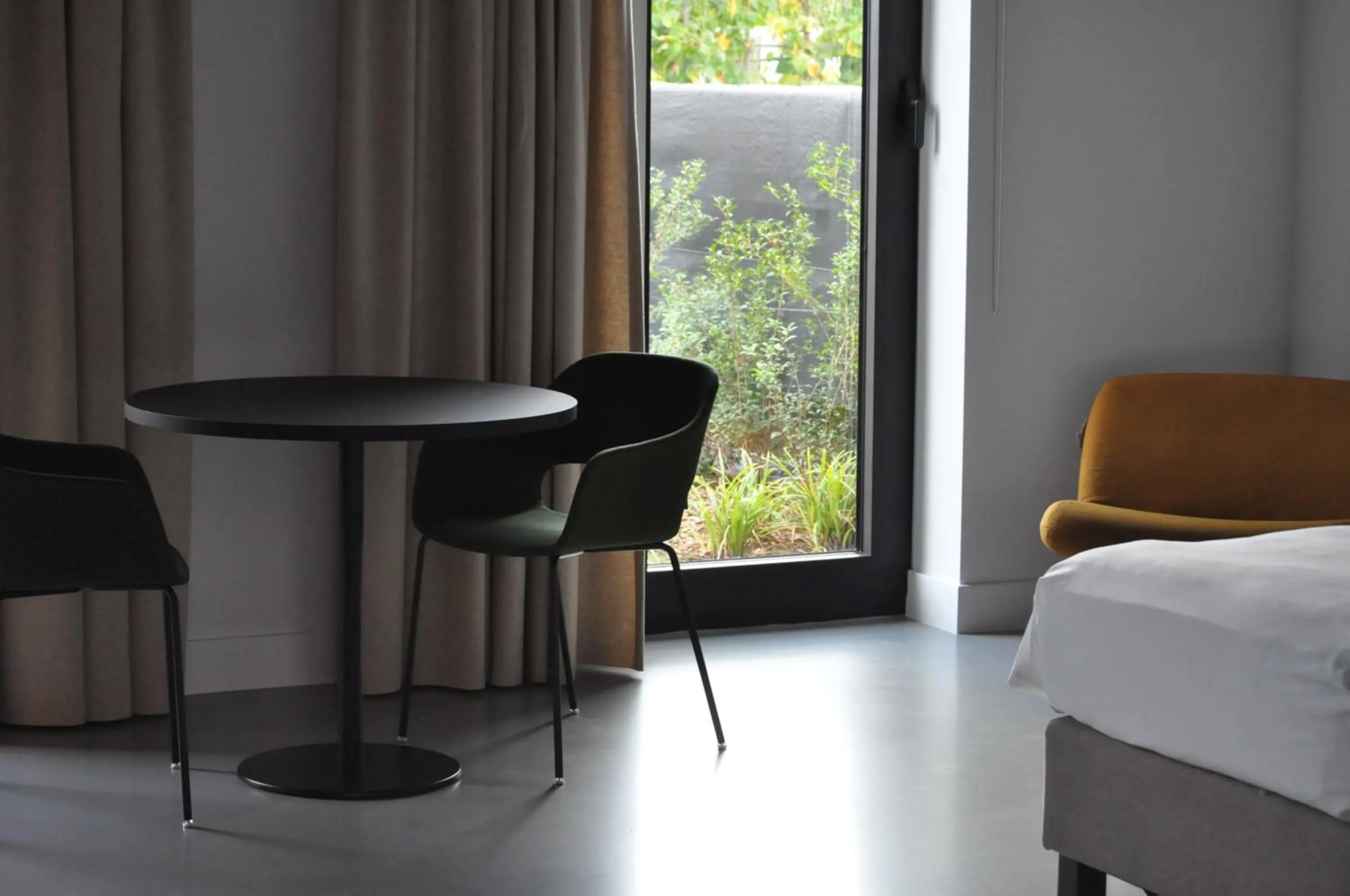 Dining area, Bed in TRUST Hotel