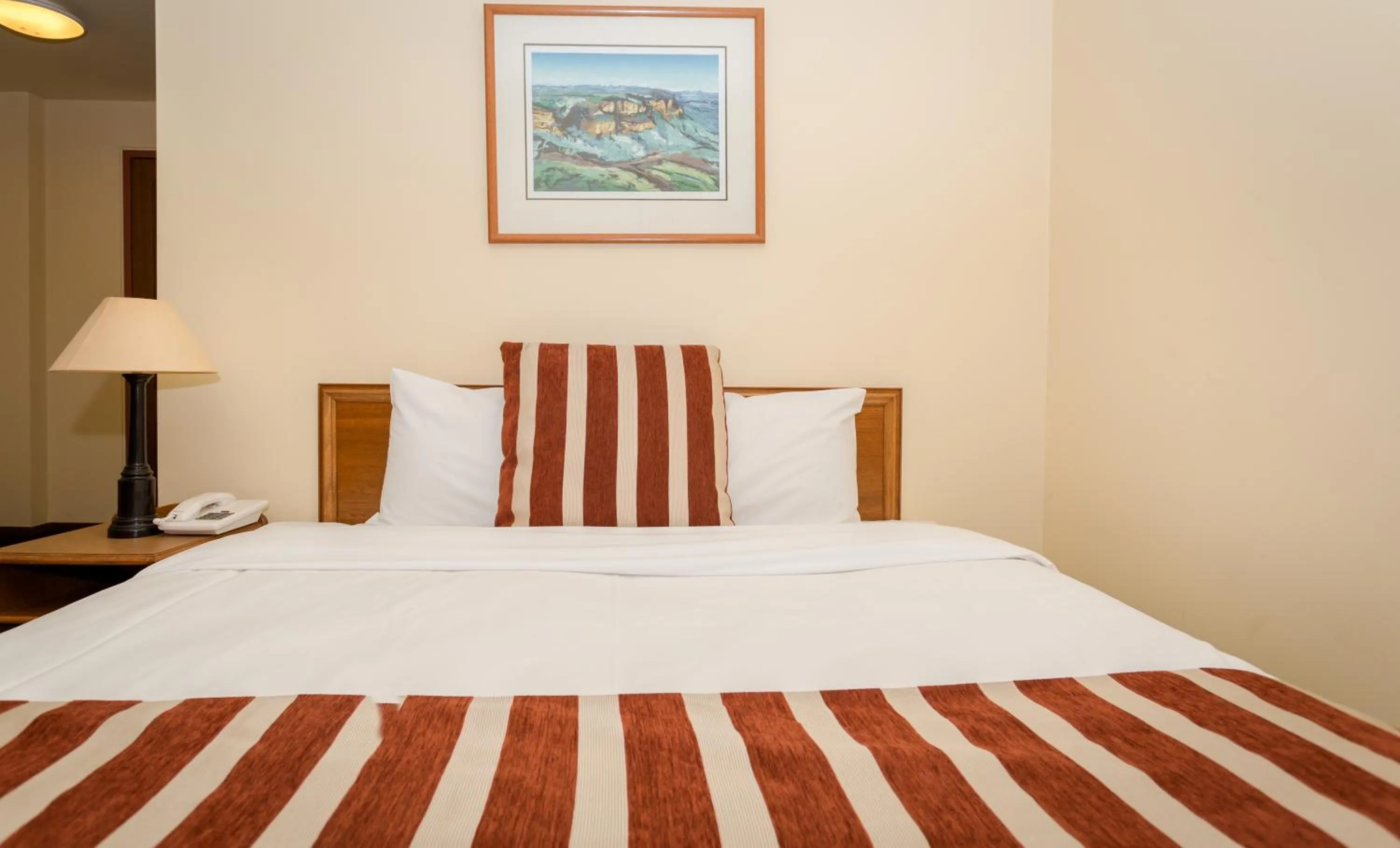 Bed in La Maison Boutique Hotel