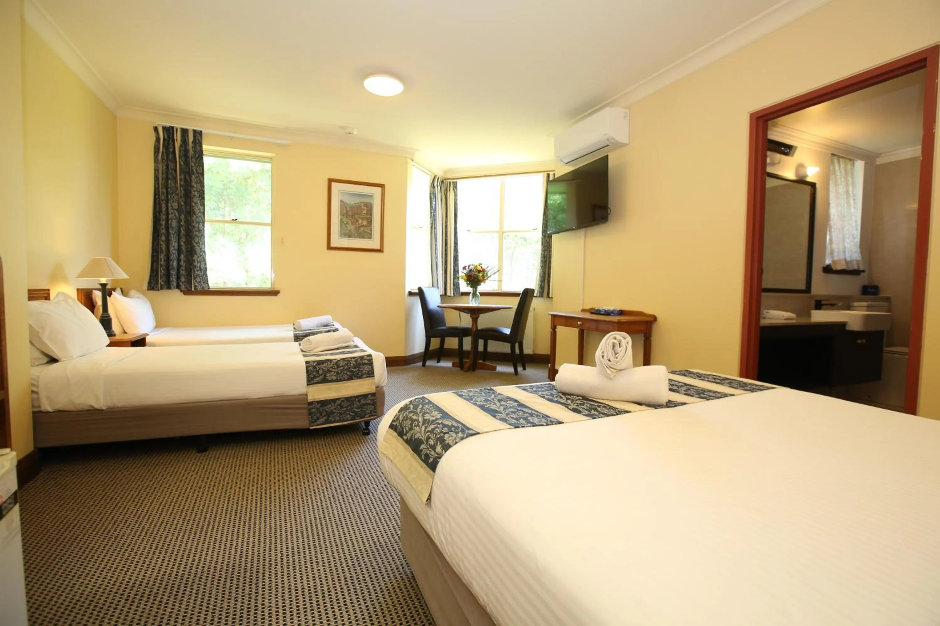 Bed in La Maison Boutique Hotel