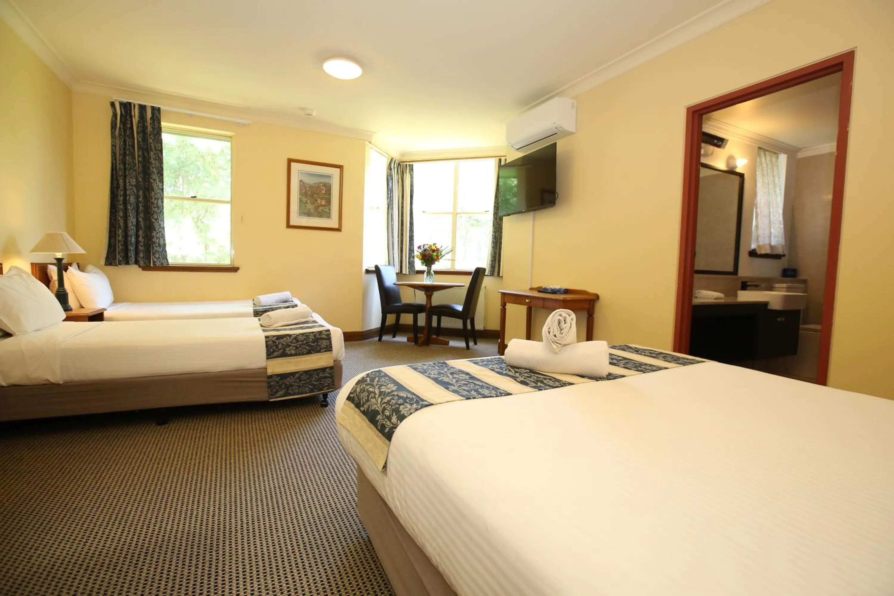 Bed in La Maison Boutique Hotel