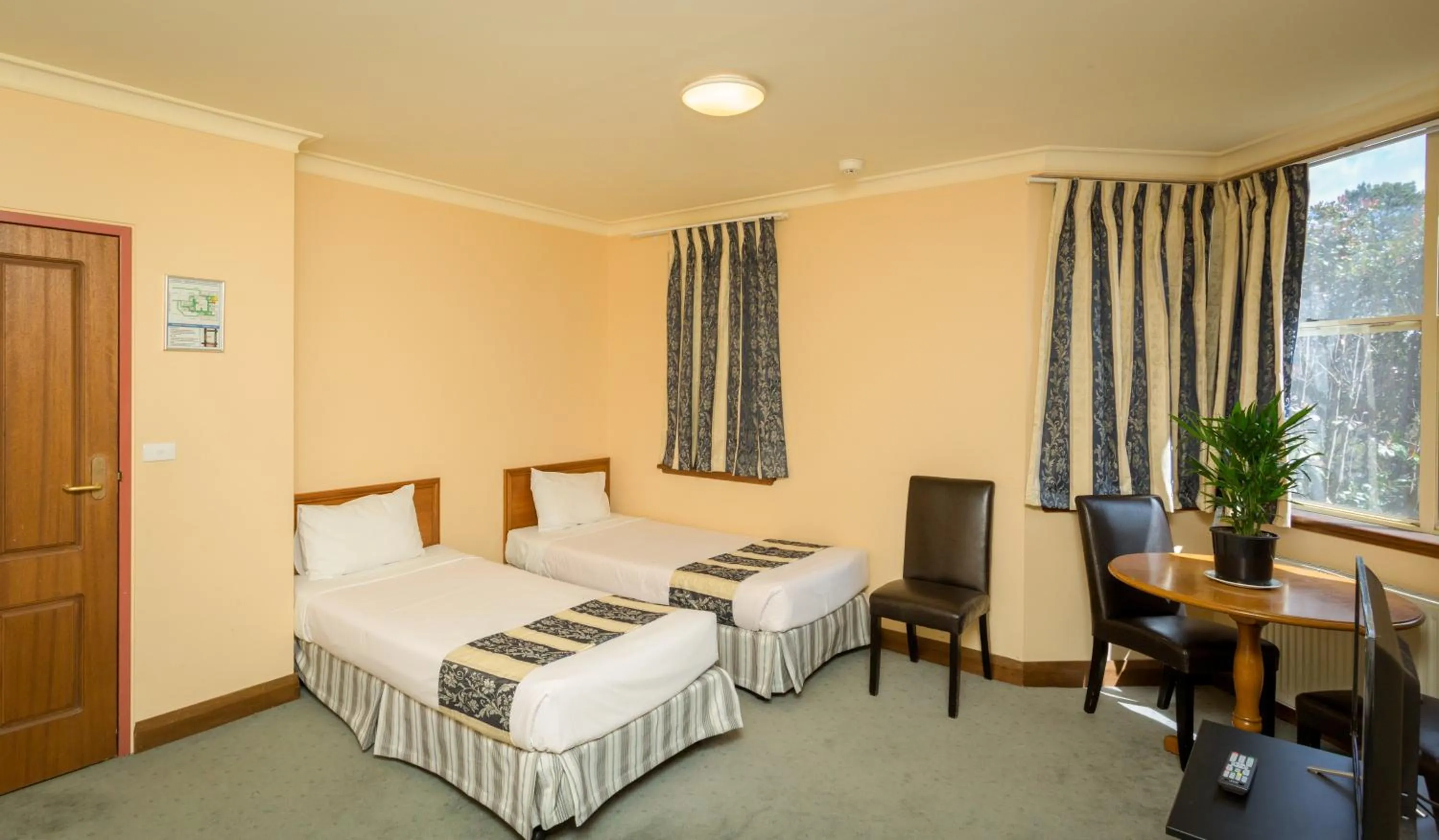 Bed in La Maison Boutique Hotel