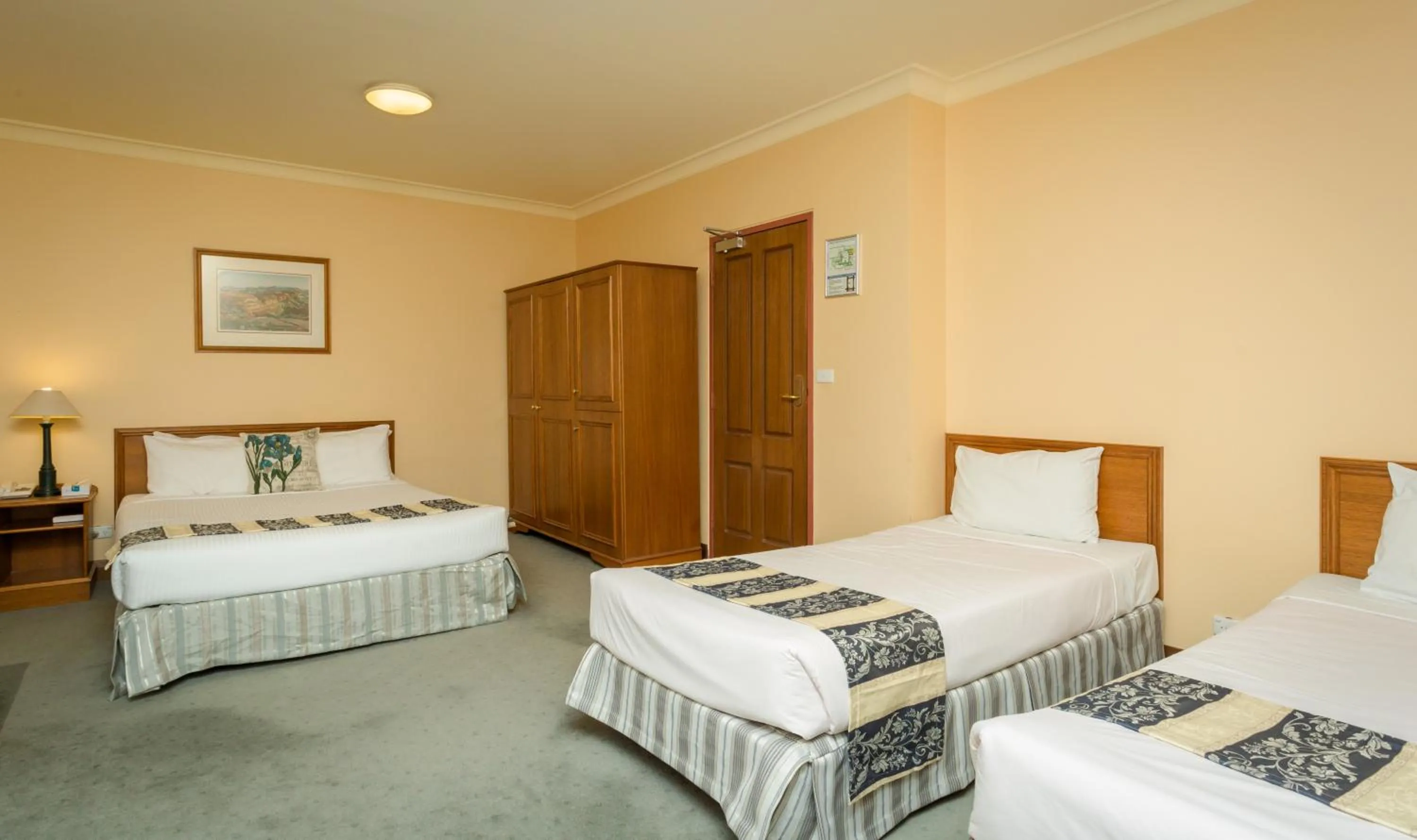 Bed in La Maison Boutique Hotel