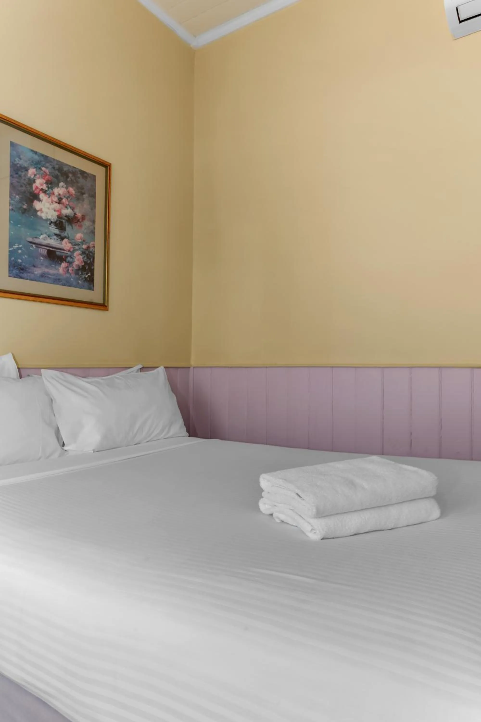 Bed in La Maison Boutique Hotel