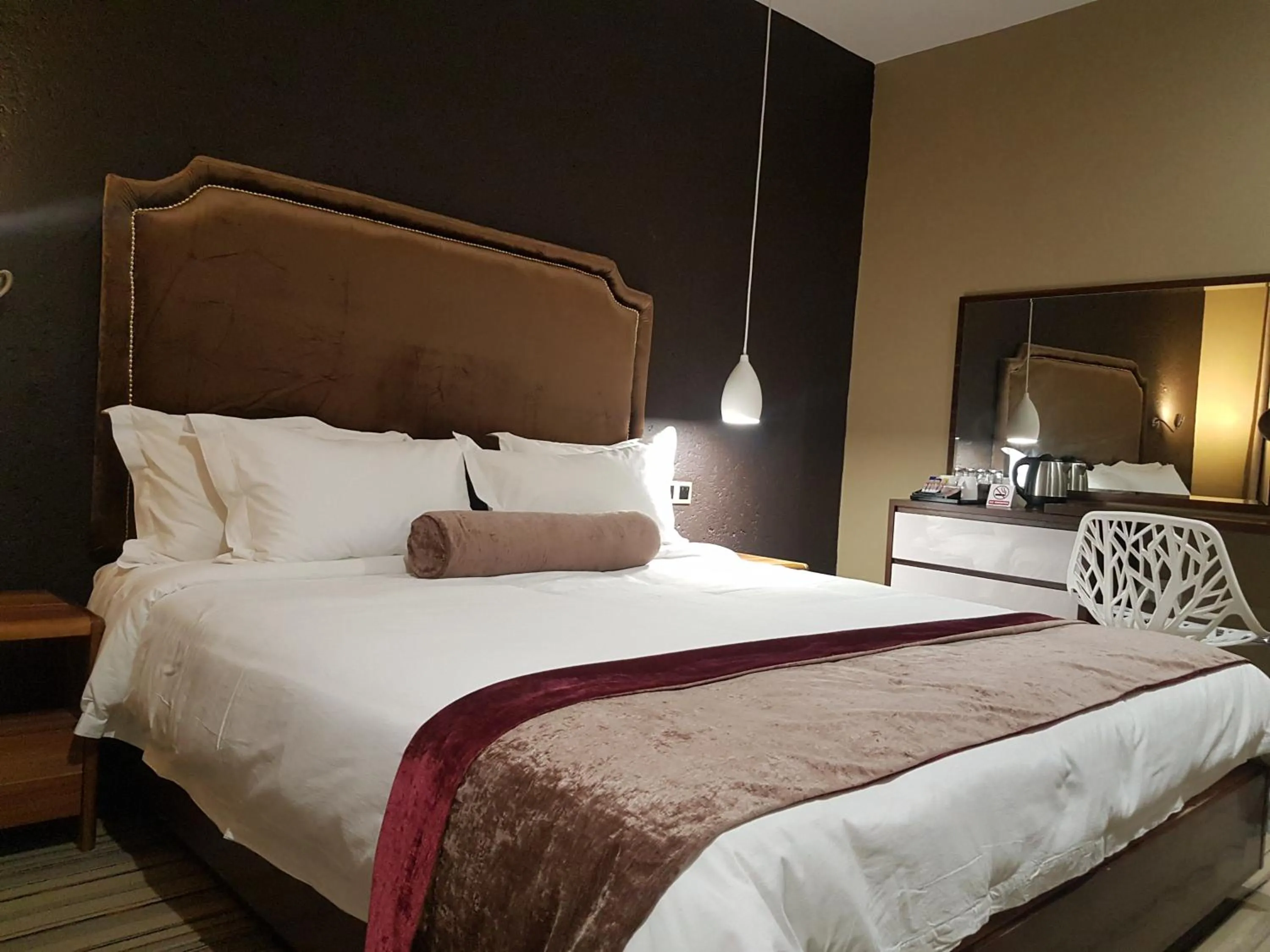 Bed in La Signature Guest house