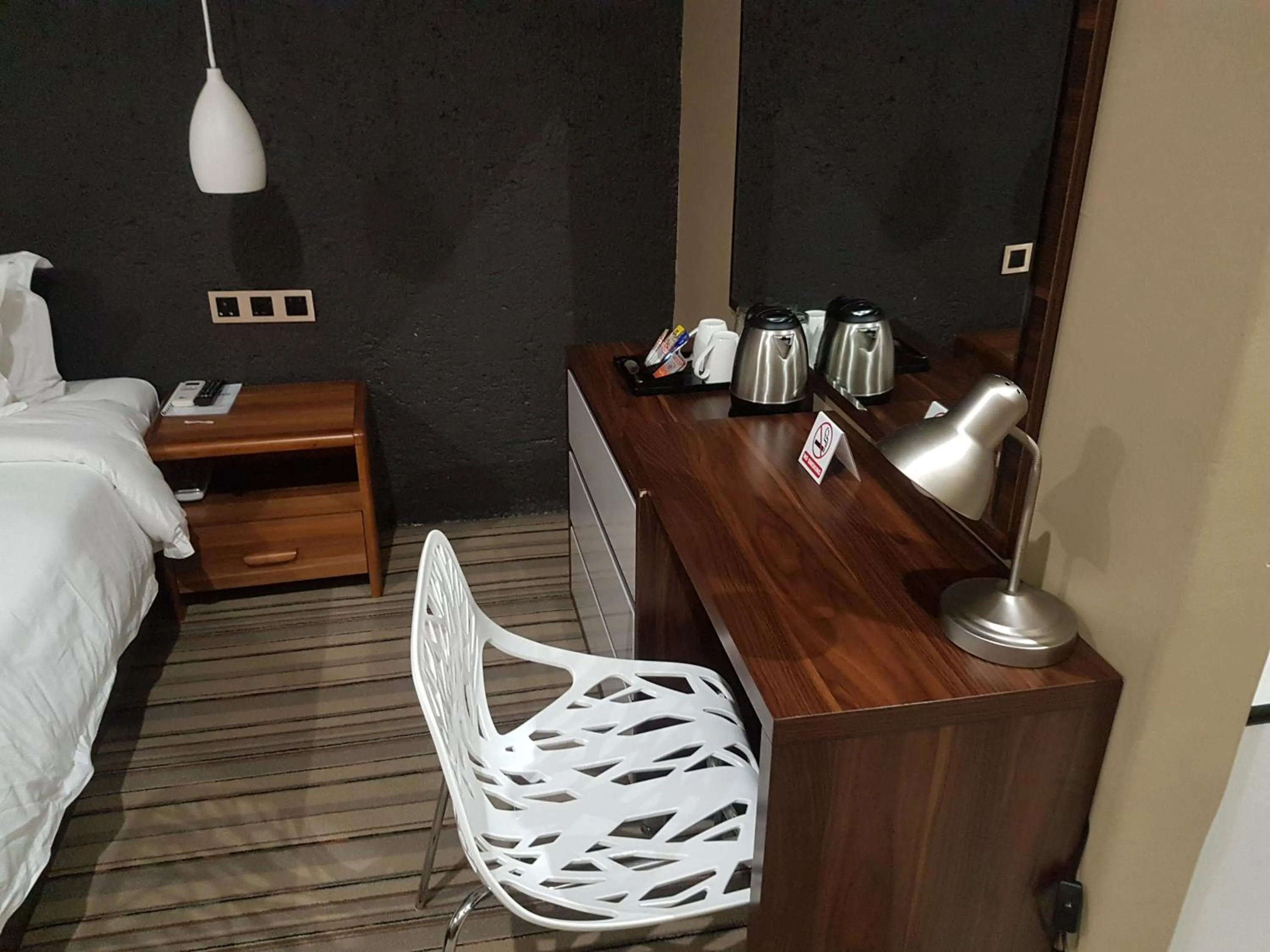 Bed in La Signature Guest house