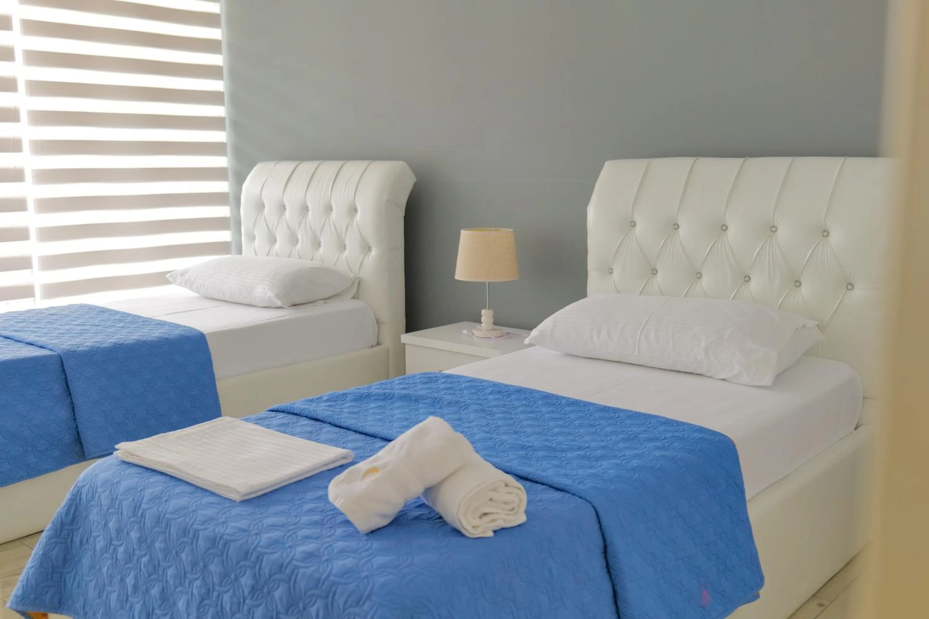 Bed in Oceanic Overview Suites