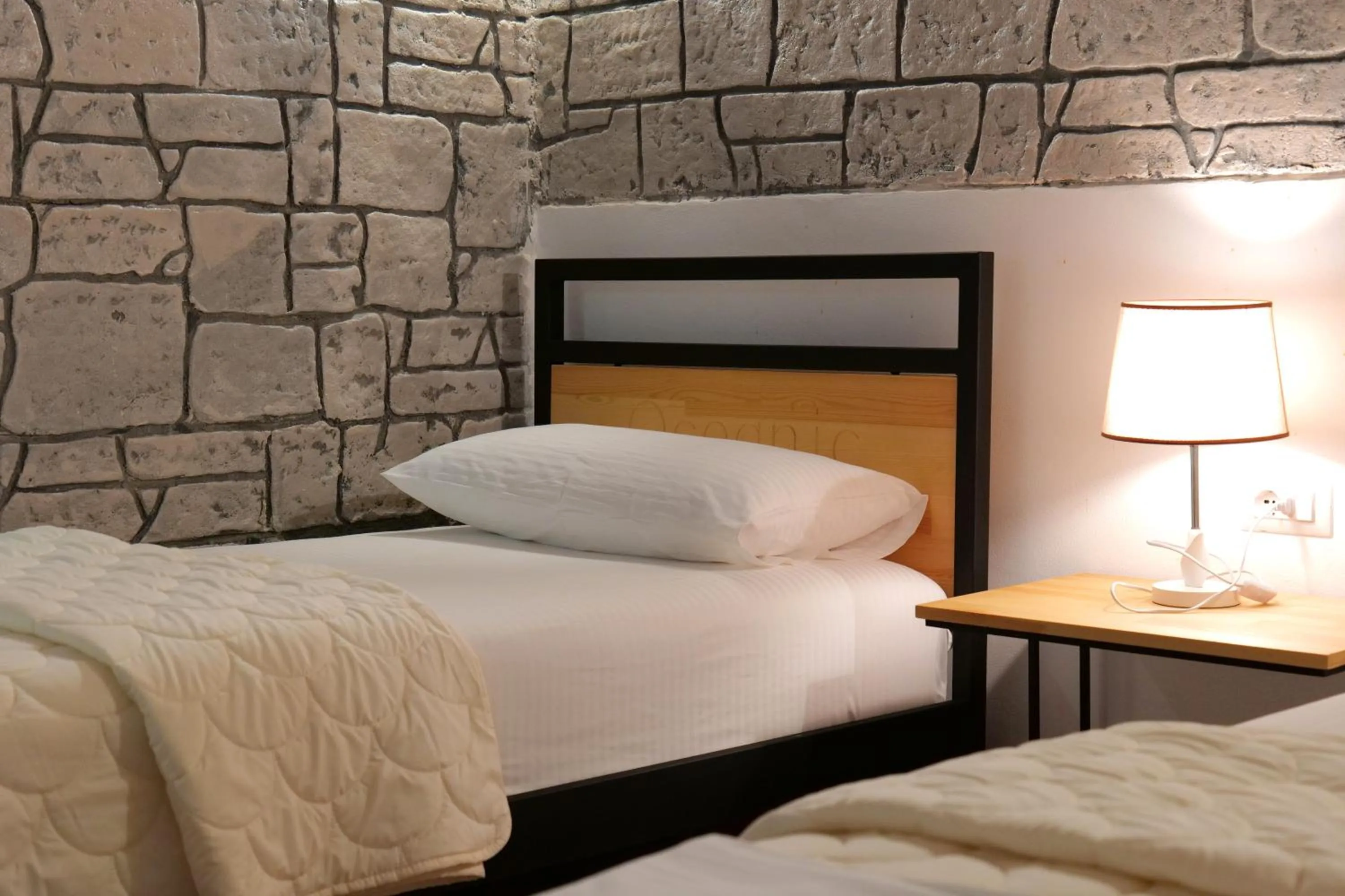 Bed in Oceanic Overview Suites