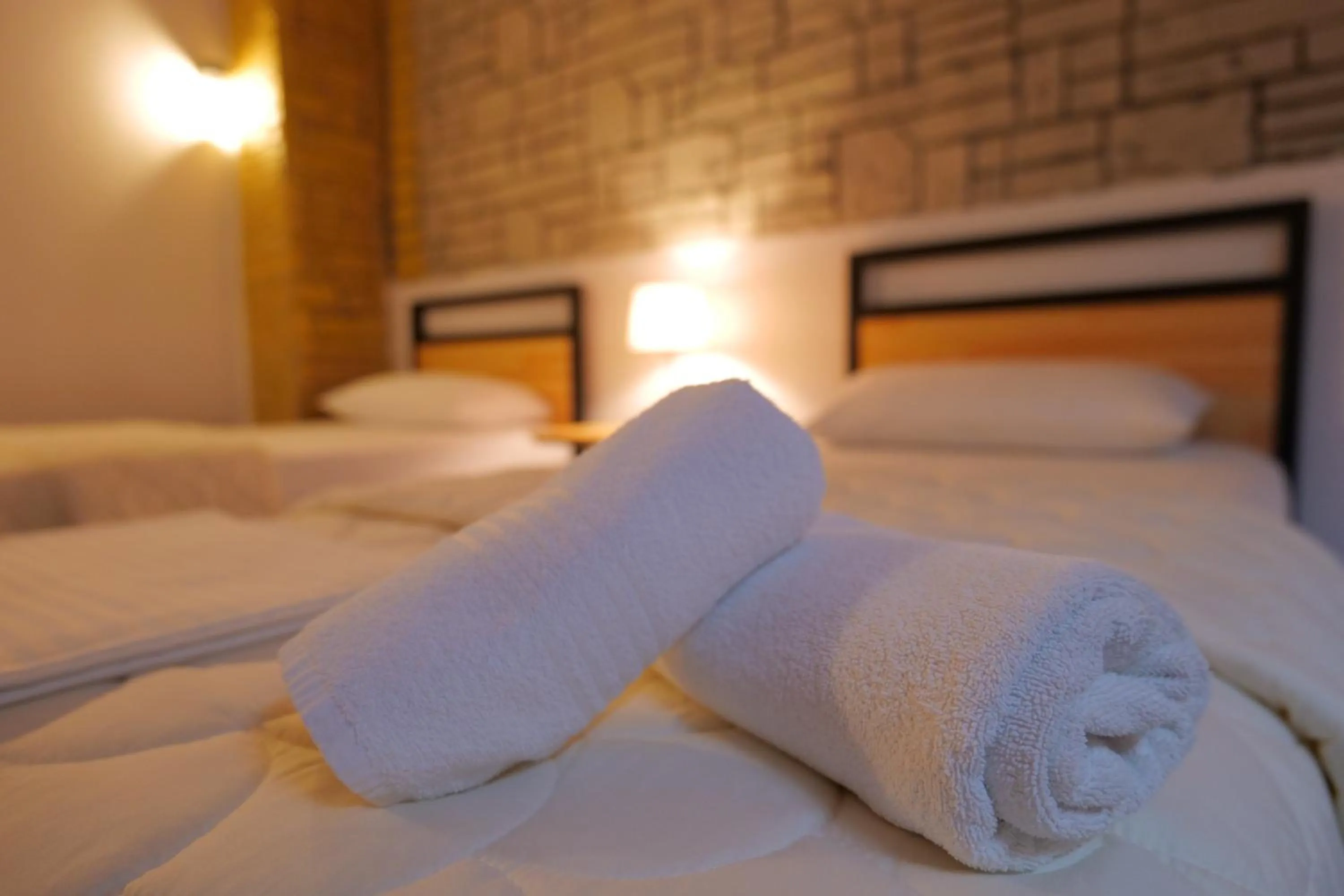 Bed in Oceanic Overview Suites