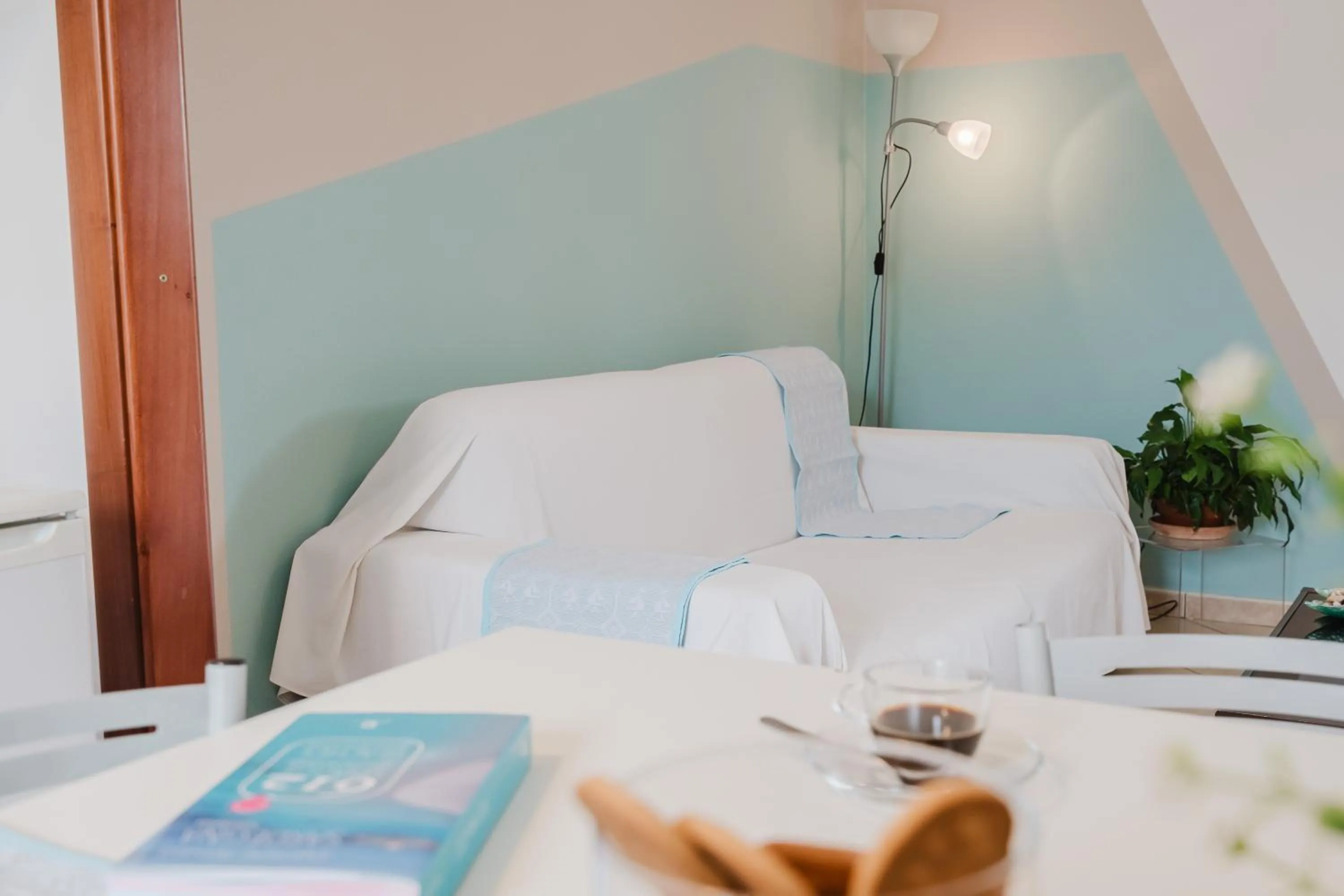 Living room, Bed in Il Melo Residence