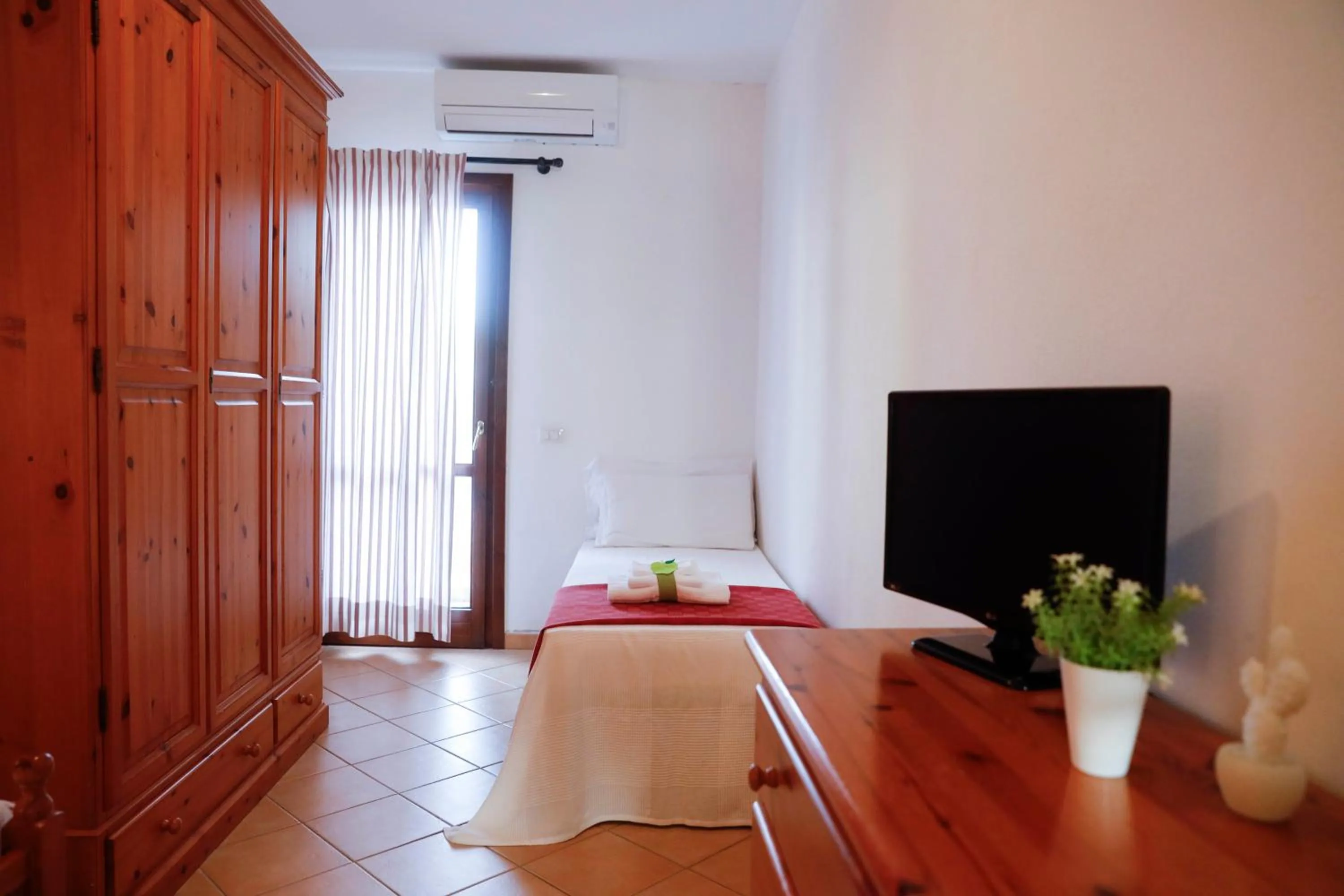 Bedroom in Il Melo Residence