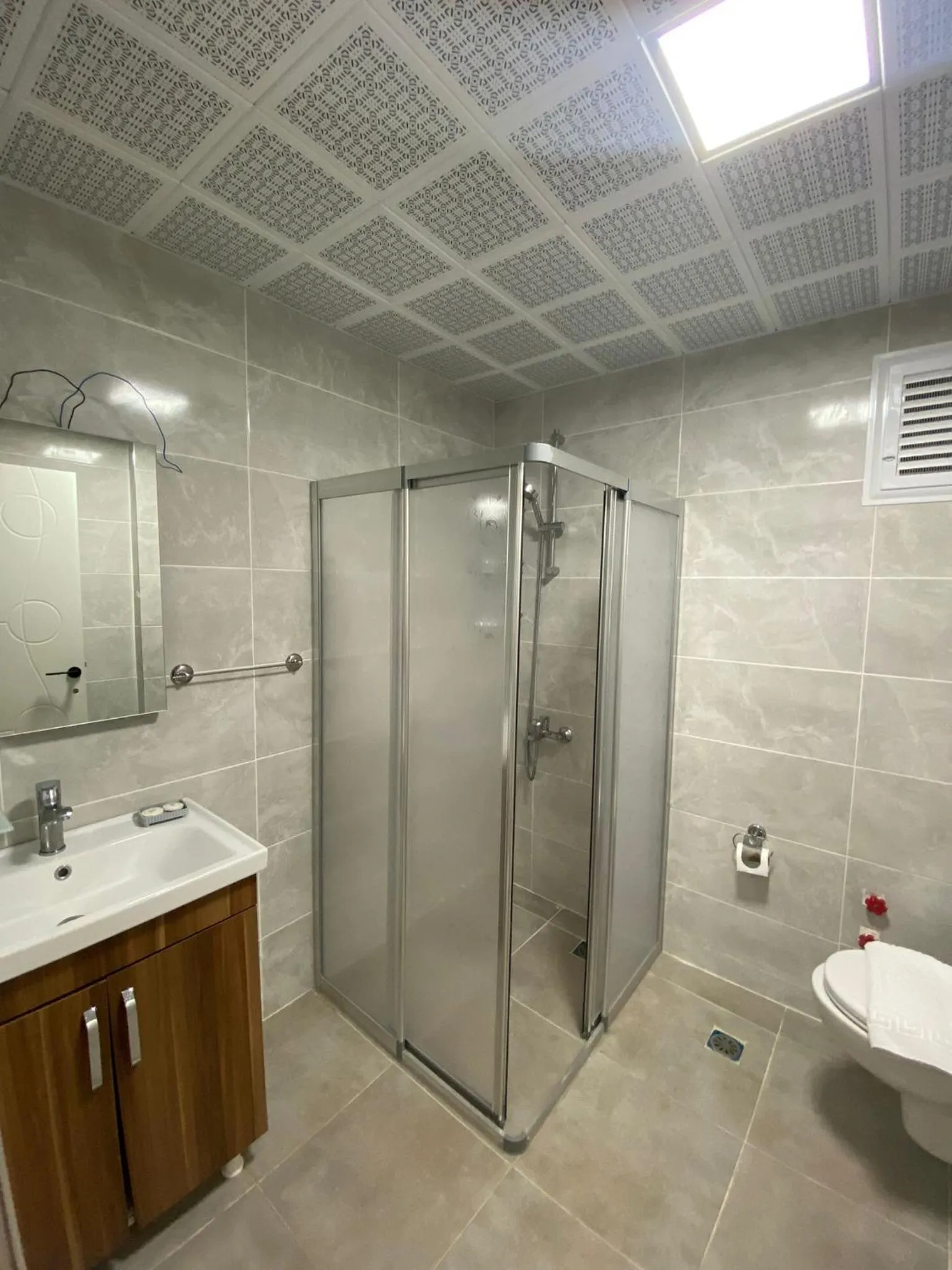 Bathroom in Theluna City Hotel