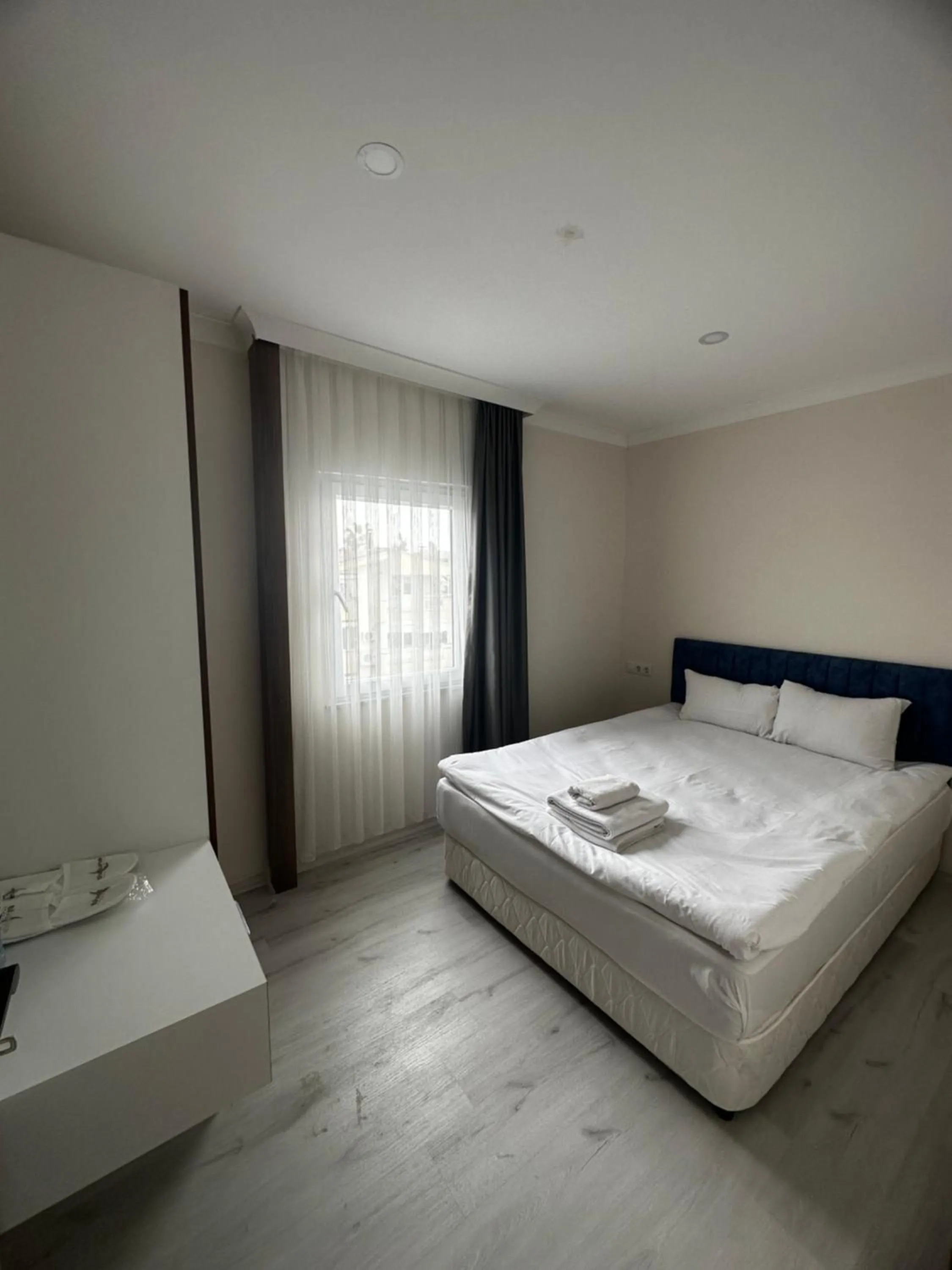 Bed in Theluna City Hotel