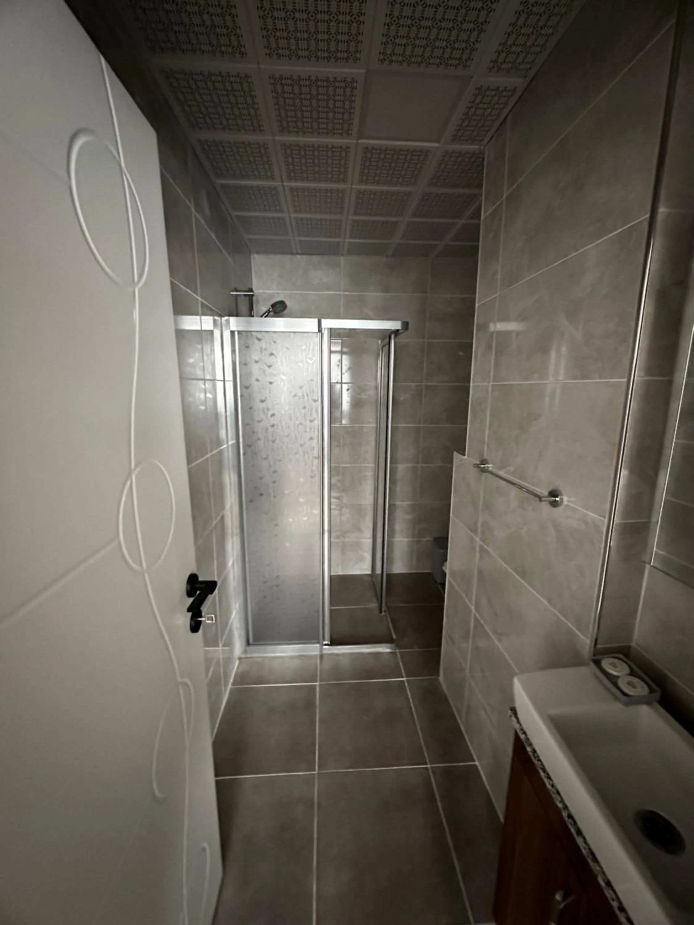 Bathroom in Theluna City Hotel