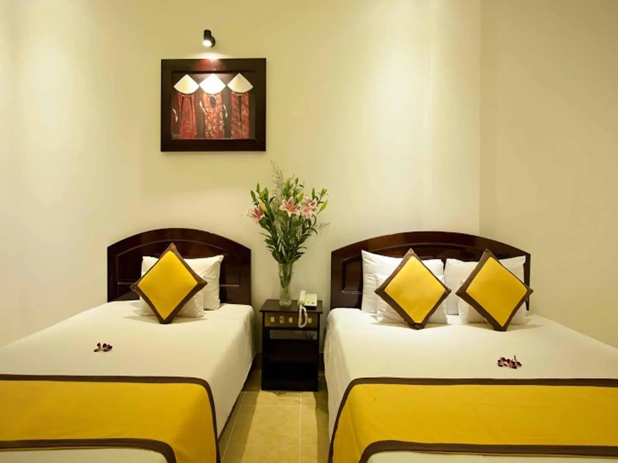 Deluxe Triple Room in Hoi An Hai Au Boutique Hotel Deluxe Triple Room in Hoi An Hai Au Boutique Hotel