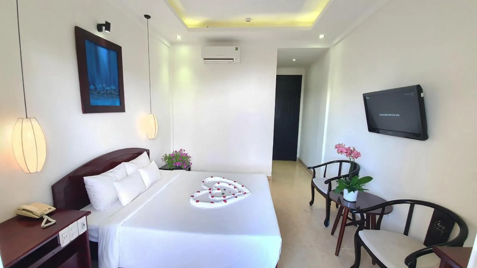Photo of the whole room, Bed in Hoi An Hai Au Boutique Hotel